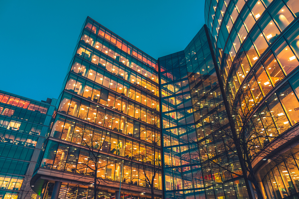 Illuminated office buildings in London at Night
