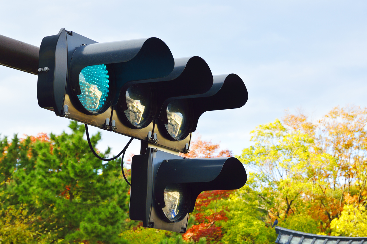 Signal and autumnal leaves.