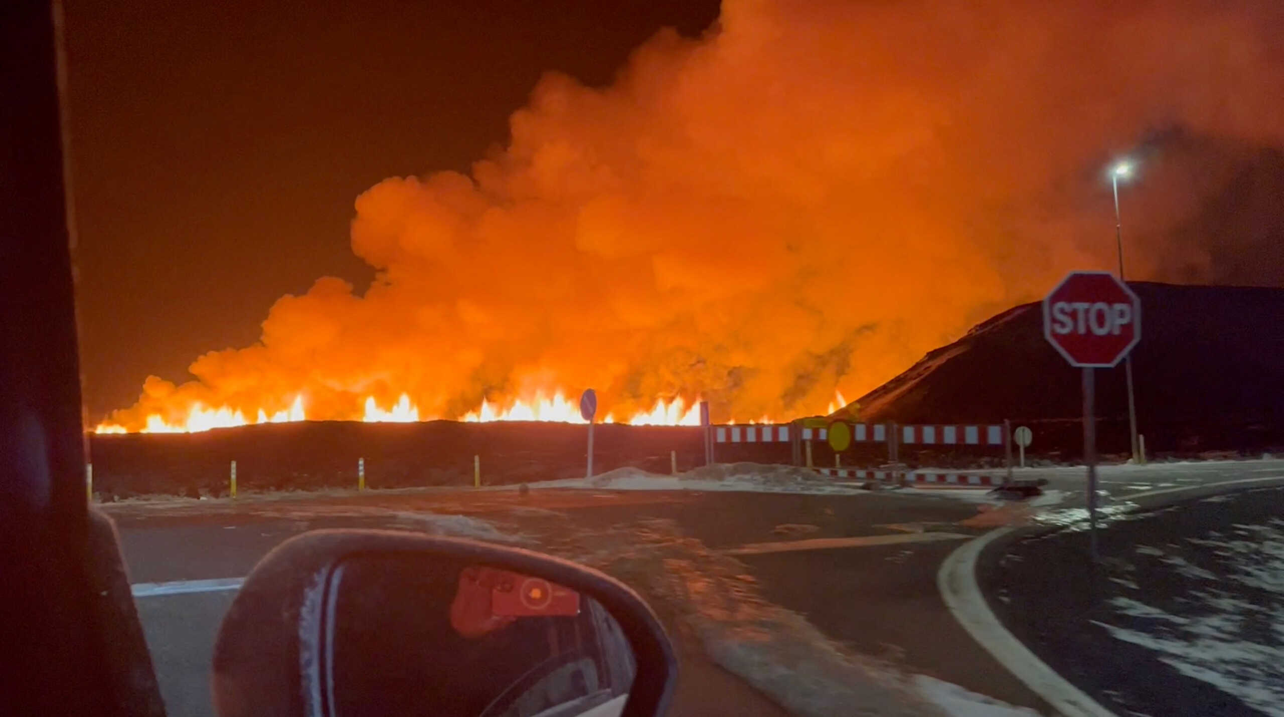 A volcano spews lava and smoke as it erupts, near Grindavik, Iceland, February 8, 2024 in this still image obtained from social media video. Marc Gibbons via REUTERS  THIS IMAGE HAS BEEN SUPPLIED BY A THIRD PARTY. MANDATORY CREDIT. NO RESALES. NO ARCHIVES.
