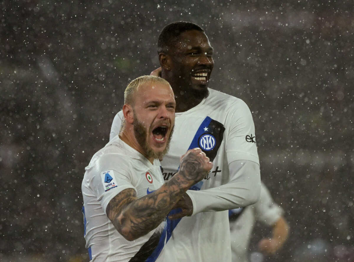 Soccer Football - Serie A - AS Roma v Inter Milan - Stadio Olimpico, Rome, Italy - February 10, 2024 Inter Milan's Marcus Thuram and Federico Dimarco celebrate after AS Roma's Angelino scores an own goal and third for Inter Milan REUTERS