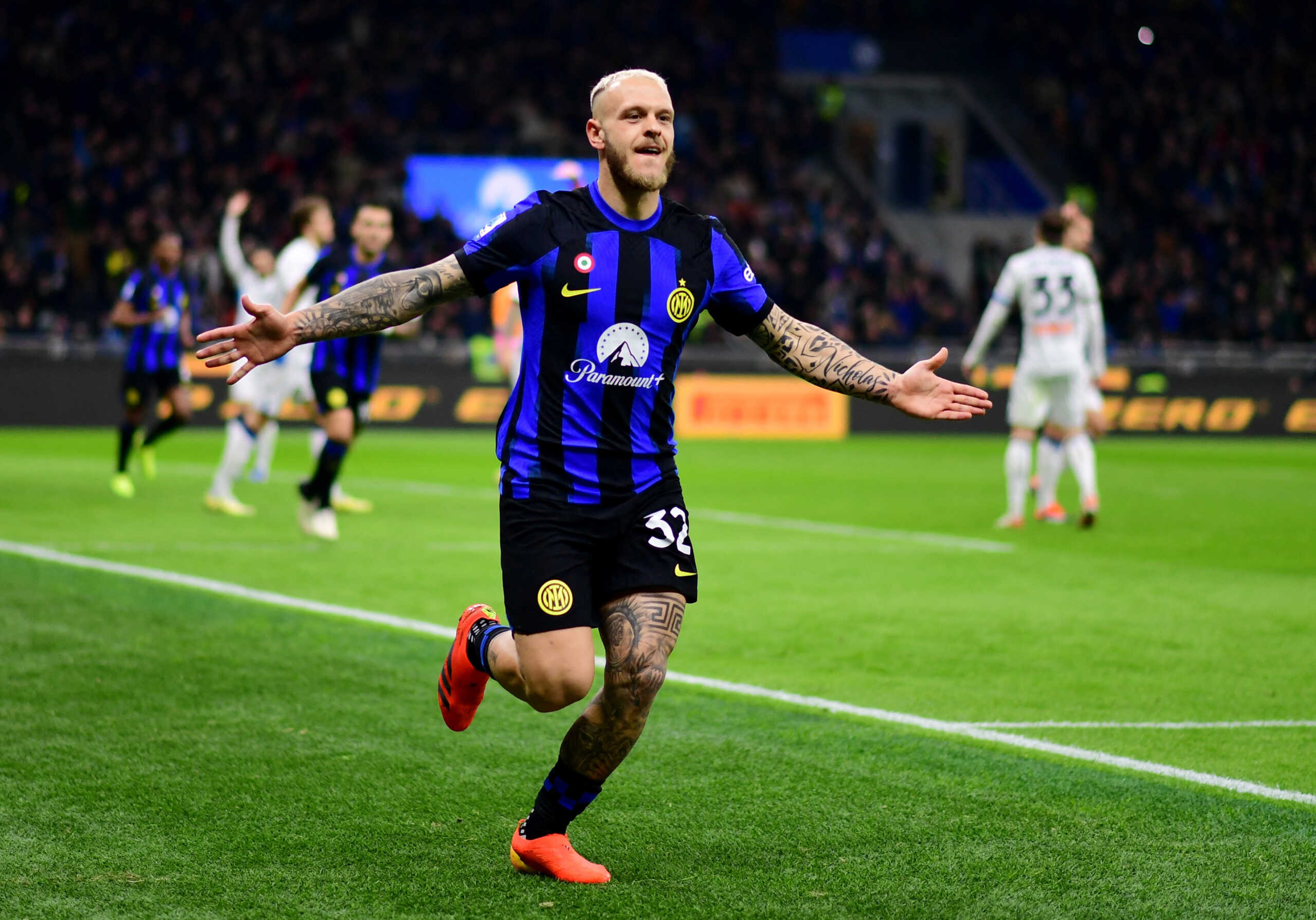 Soccer Football - Serie A - Inter Milan v Atalanta - San Siro, Milan, Italy - February 28, 2024 Inter Milan's Federico Dimarco celebrates scoring their third goal REUTERS