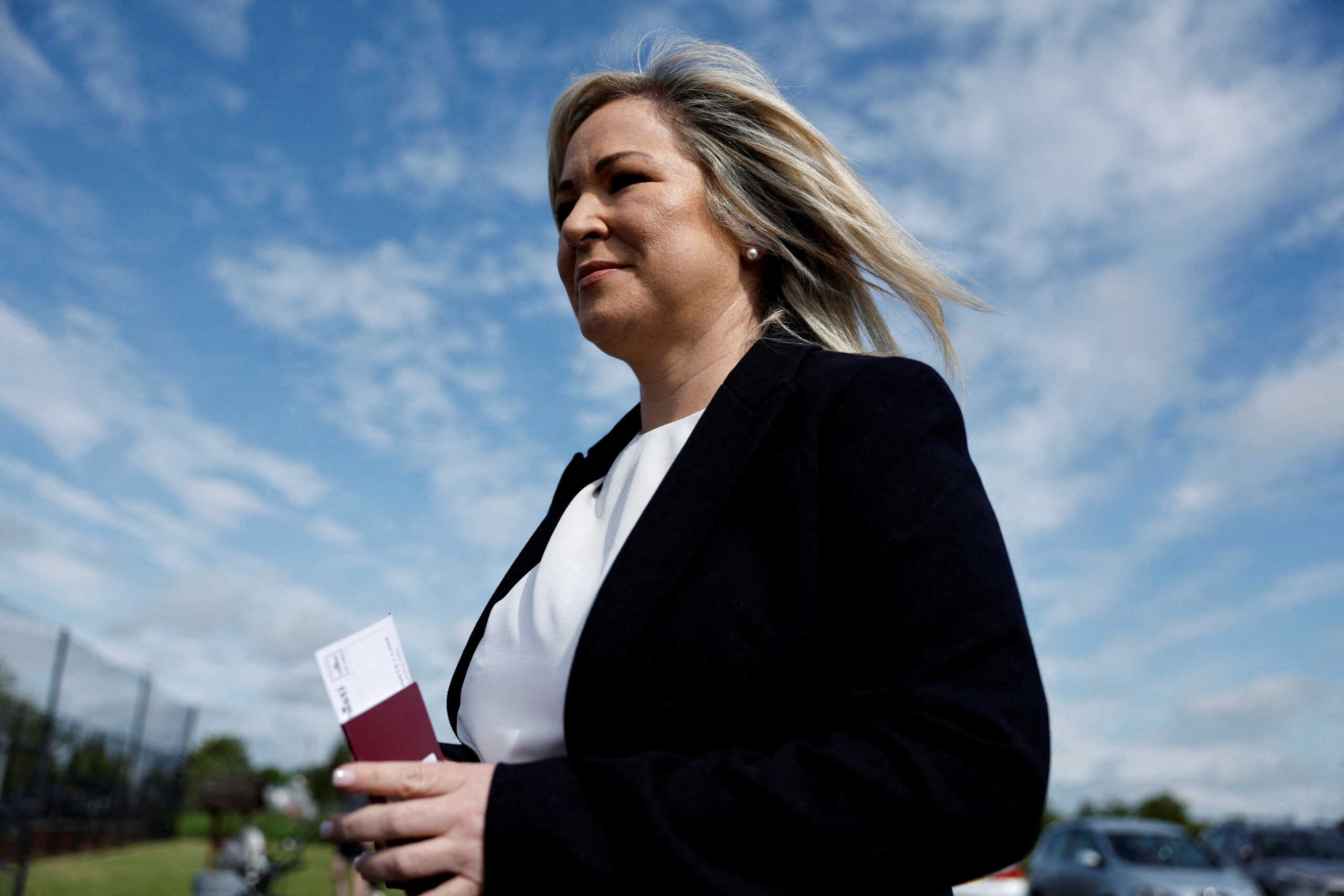 FILE PHOTO: Vice President of Sinn Fein Michelle O'Neill leaves after voting at a polling station during local elections in Coalisland, Northern Ireland, May 18, 2023. REUTERS