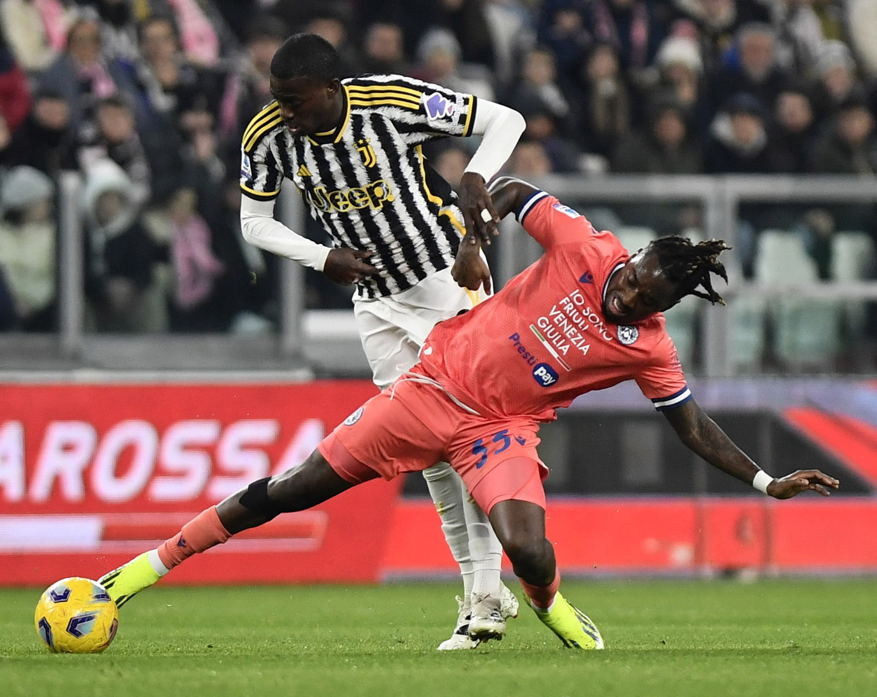 Soccer Football - Serie A - Juventus v Udinese - Allianz Stadium, Turin, Italy - February 12, 2024 Juventus' Timothy Weah in action with Udinese's Jordan Zemura REUTERS