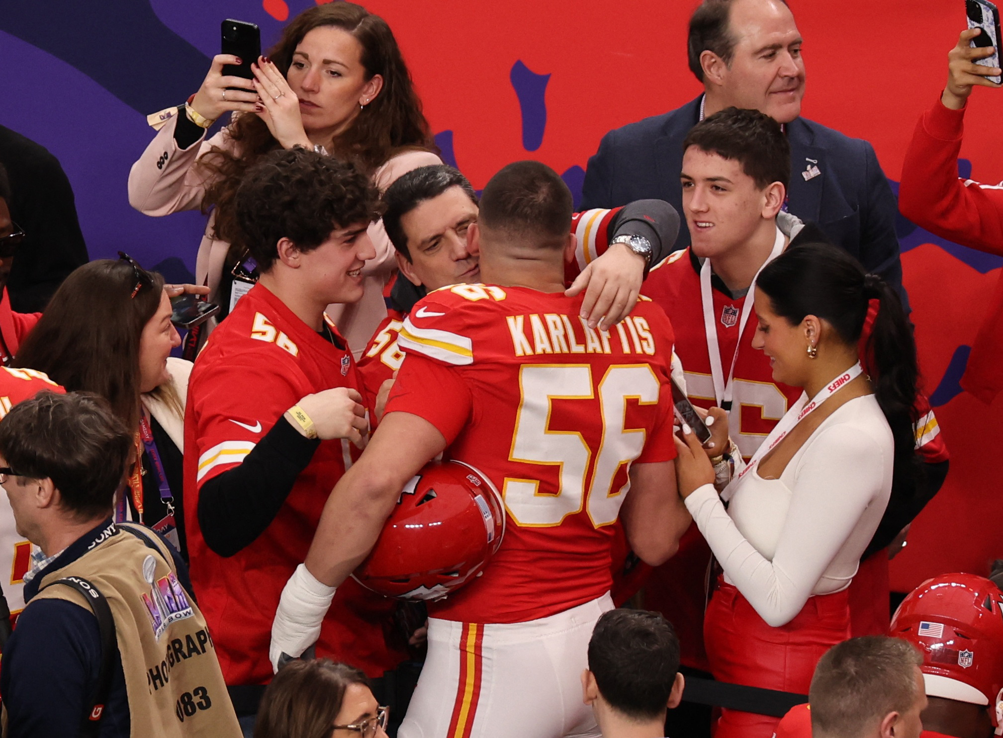 Football - NFL - Super Bowl LVIII - Kansas City Chiefs v San Francisco 49ers - Allegiant Stadium, Las Vegas, Nevada, United States - February 11, 2024 Kansas City Chiefs' George Karlaftis with members of his family before the game REUTERS