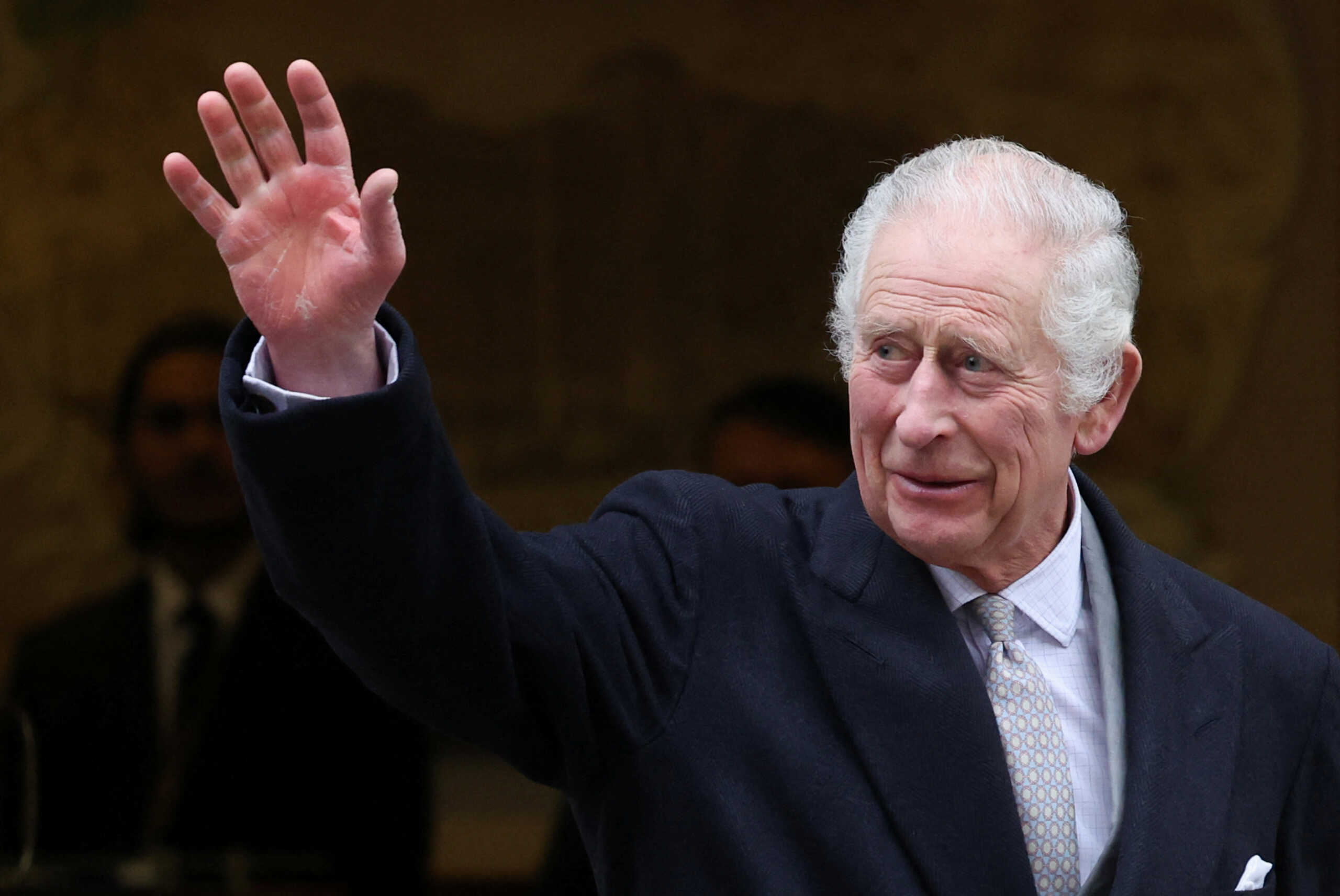 Britain's King Charles waves as he leaves the London Clinic after receiving treatment for an enlarged prostate in London, Britain January 29, 2024. REUTERS