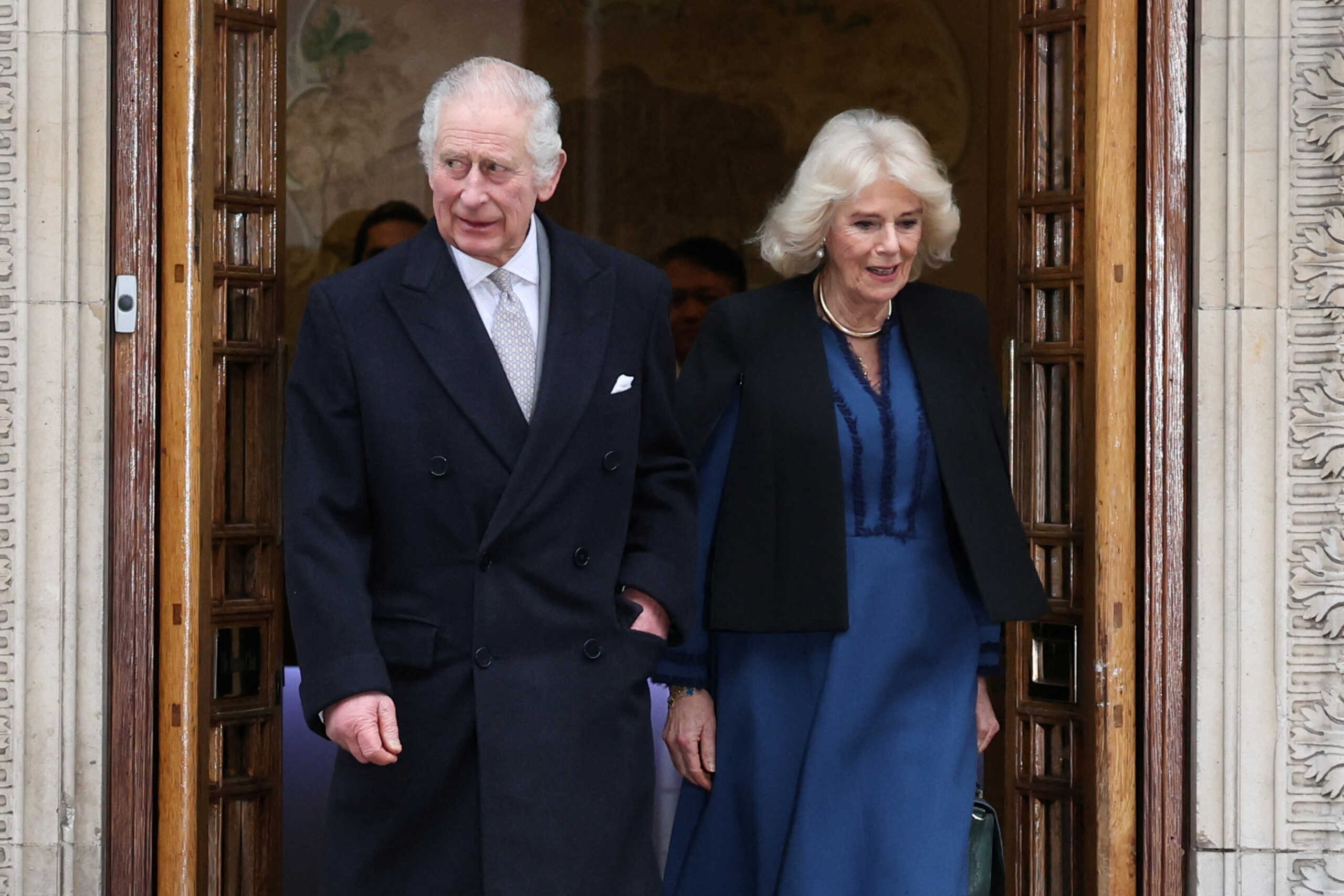 Britain's King Charles leaves the London Clinic with Britain's Queen Camilla after receiving treatment for an enlarged prostate in London, Britain January 29, 2024. REUTERS