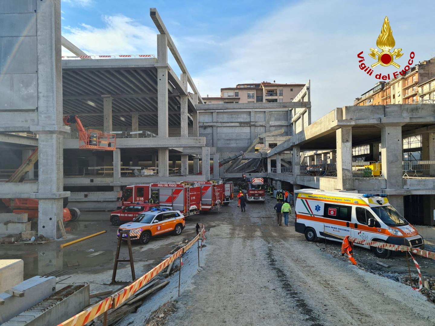 Emergency service members work at a construction site where a collapse occurred, in Florence, Italy February 16, 2024. Vigili del Fuoco