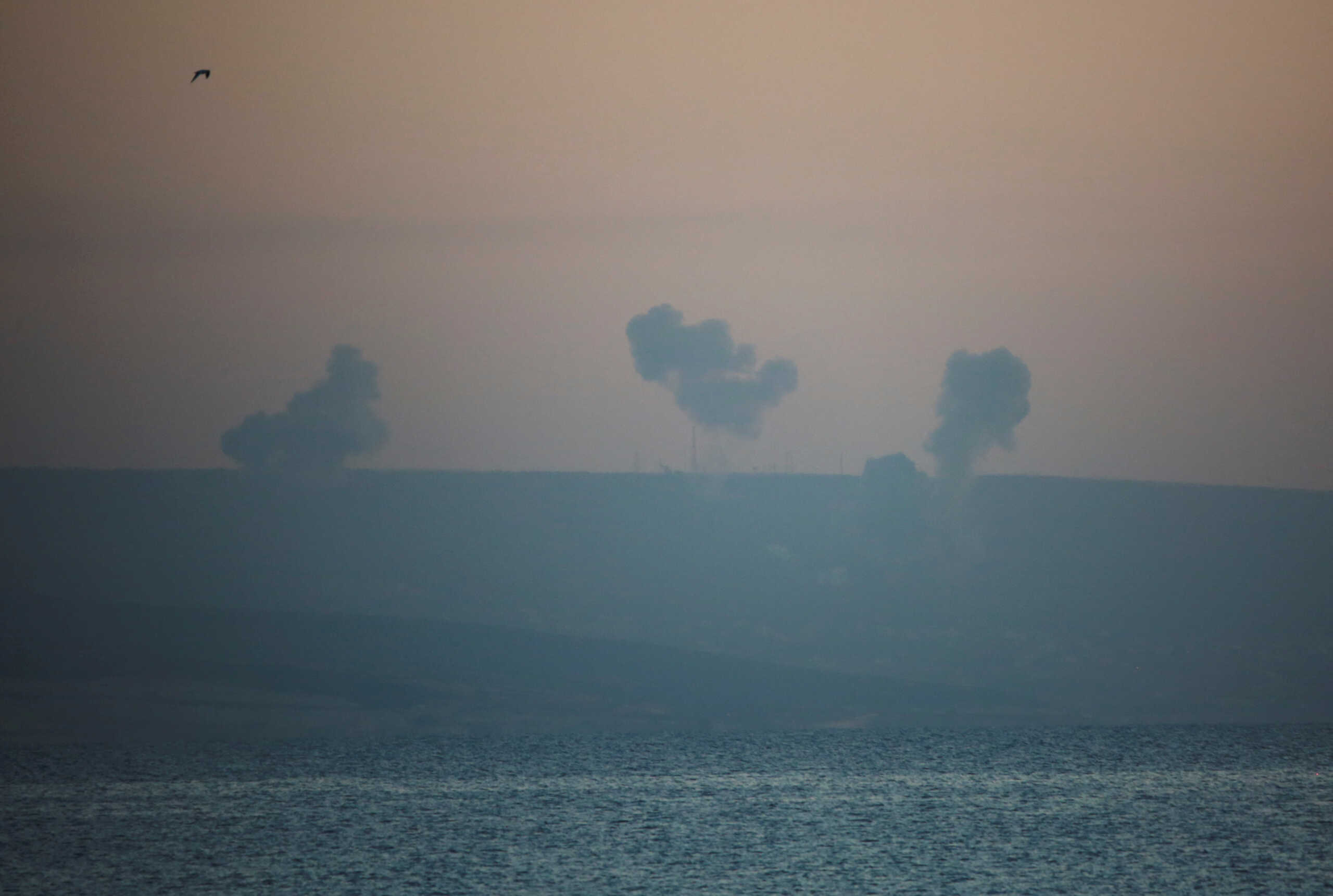FILE PHOTO: Smoke rises on the Lebanese side near the border with Israel, amid ongoing cross-border hostilities between Hezbollah and Israeli forces, as seen from Tyre, southern Lebanon December 2, 2023. REUTERS