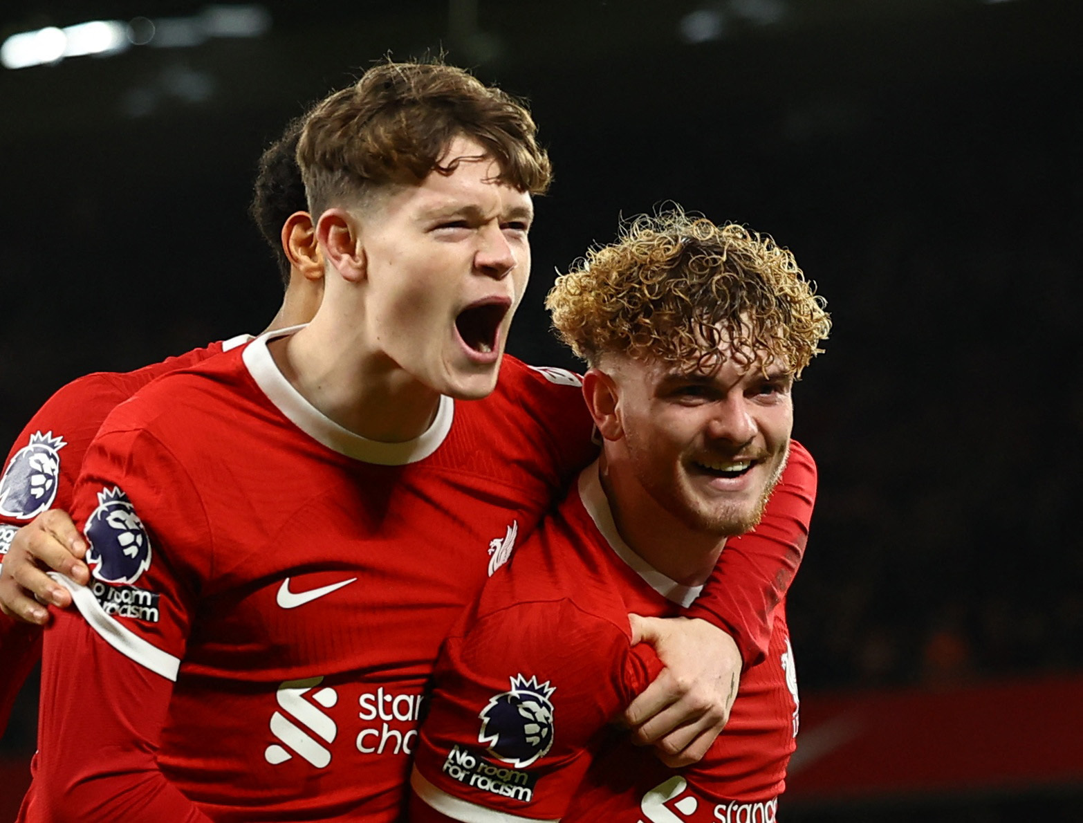 Soccer Football - Premier League - Liverpool v Luton Town - Anfield, Liverpool, Britain - February 21, 2024 Liverpool's Harvey Elliott celebrates scoring their fourth goal with James McConnell REUTERS