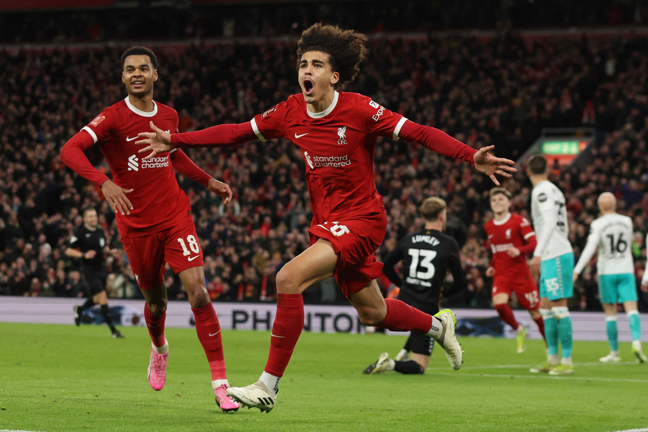 Soccer Football - FA Cup - Fifth Round - Liverpool v Southampton - Anfield, Liverpool, Britain - February 28, 2024 Liverpool's Jayden Danns celebrates scoring their second goal with Cody Gakpo REUTERS
