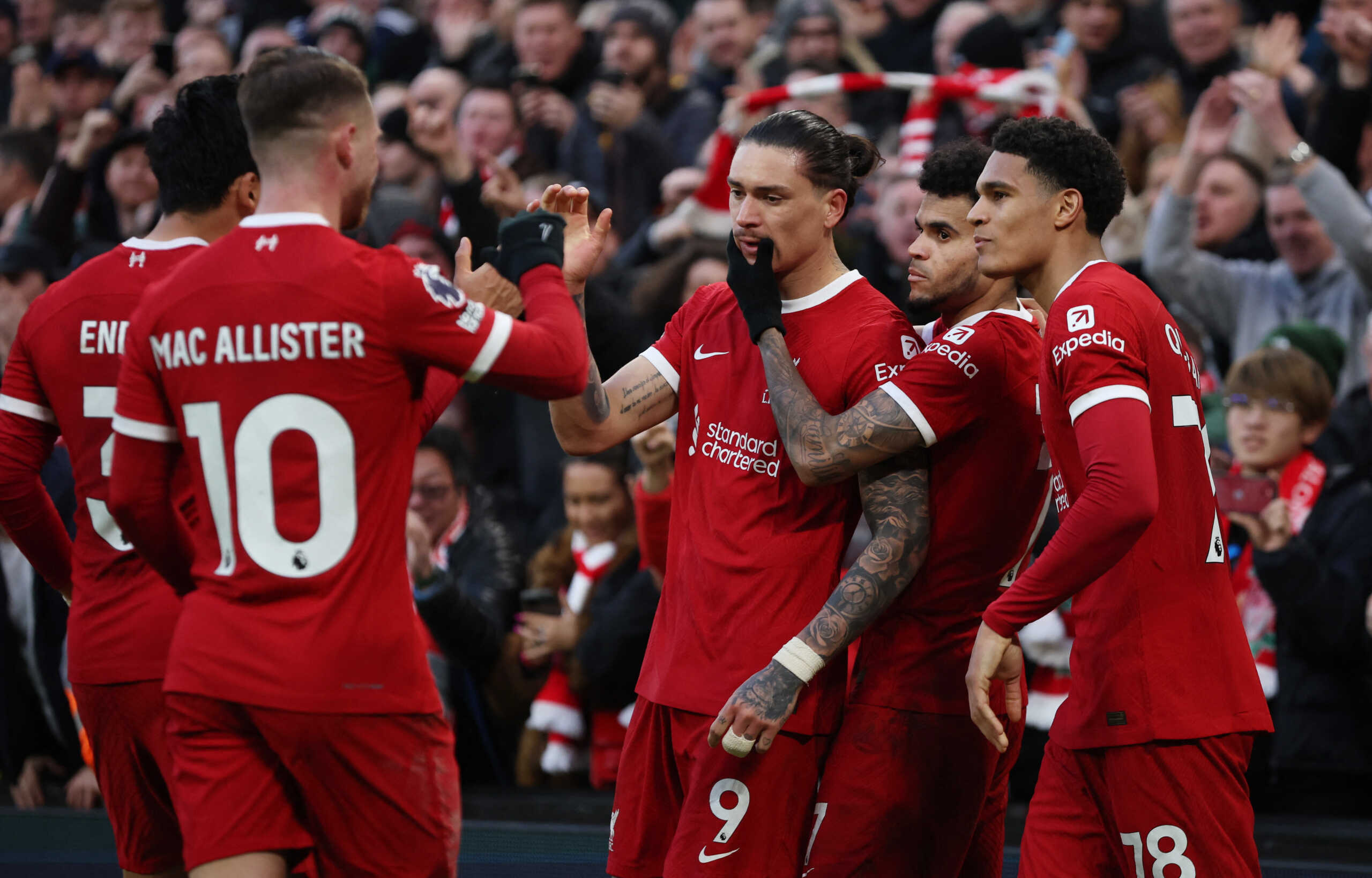 Soccer Football - Premier League - Liverpool v Burnley - Anfield, Liverpool, Britain - February 10, 2024 Liverpool's Darwin Nunez celebrates scoring their third goal with Jarell Quansah and Luis Diaz REUTERS