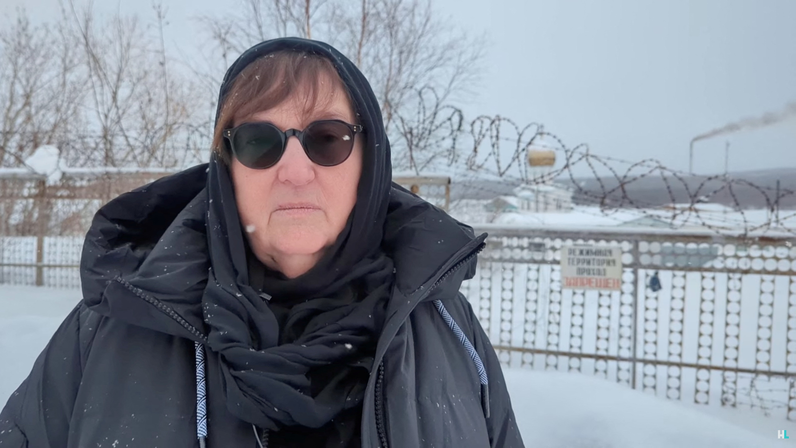 Mother of late Russian opposition leader Alexei Navalny, Lyudmila Navalnaya, delivers a video address to Russian President Vladimir Putin as she stands near the IK-3 penal?colony in the settlement of Kharp in the Yamal-Nenets Region, Russia, in this still image taken from a handout video released February 20, 2024. Alexei Navalny YouTube Channel