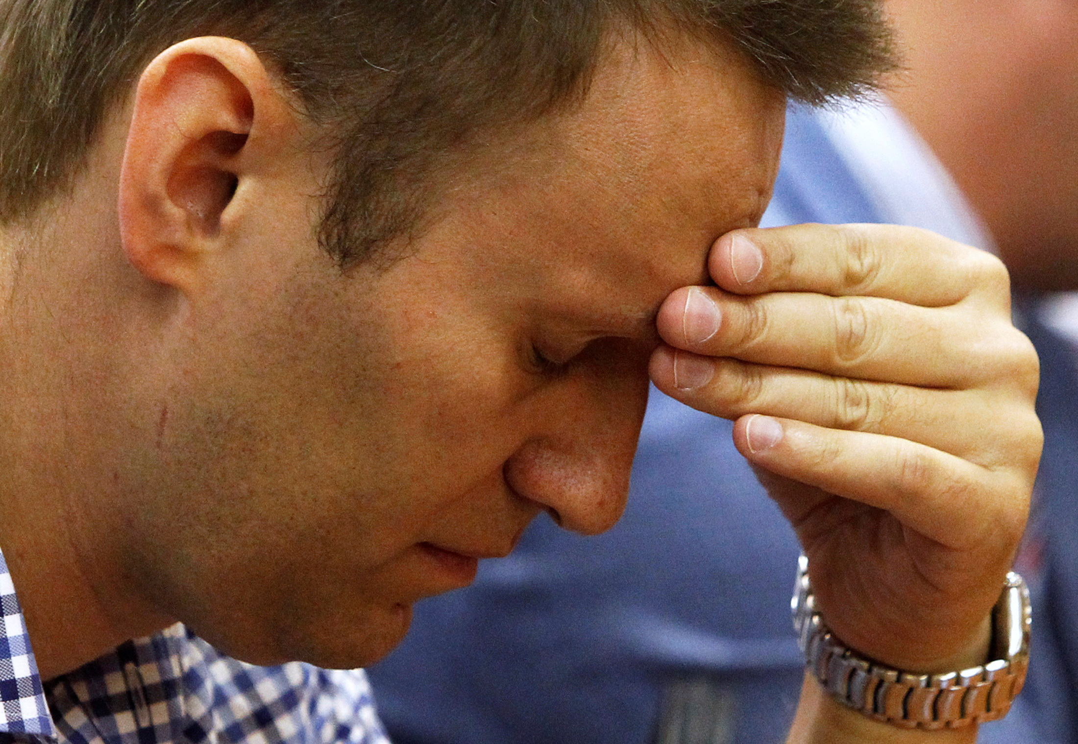 FILE PHOTO: Russian protest leader Alexei Navalny attends a court hearing in Kirov, July 18, 2013. a six-year sentence. REUTERS