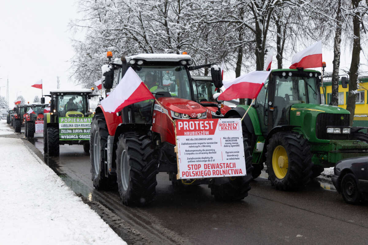 Polish farmers protest near the border with Ukraine over price pressures, taxes and green regulation, grievances shared by farmers across Europe, in Hrubieszow, Poland, February 9, 2024. Banner reads "Stop the devastation of Polish agriculture". Jakub Orzechowski