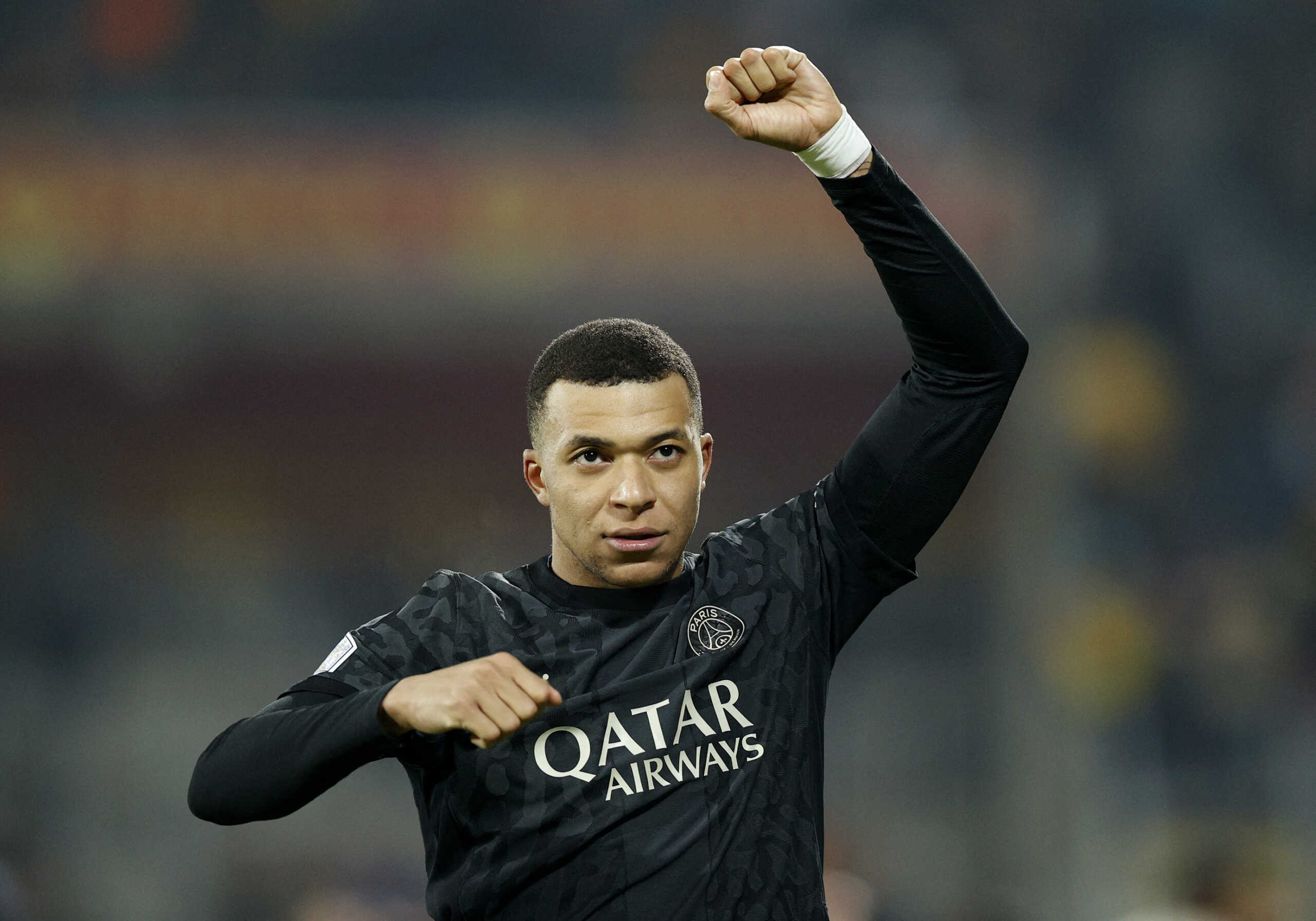 Soccer Football - Ligue 1 - RC Lens v Paris St Germain - Stade Bollaert-Delelis, Lens, France - January 14, 2024 Paris St Germain's Kylian Mbappe celebrates after the match REUTERS