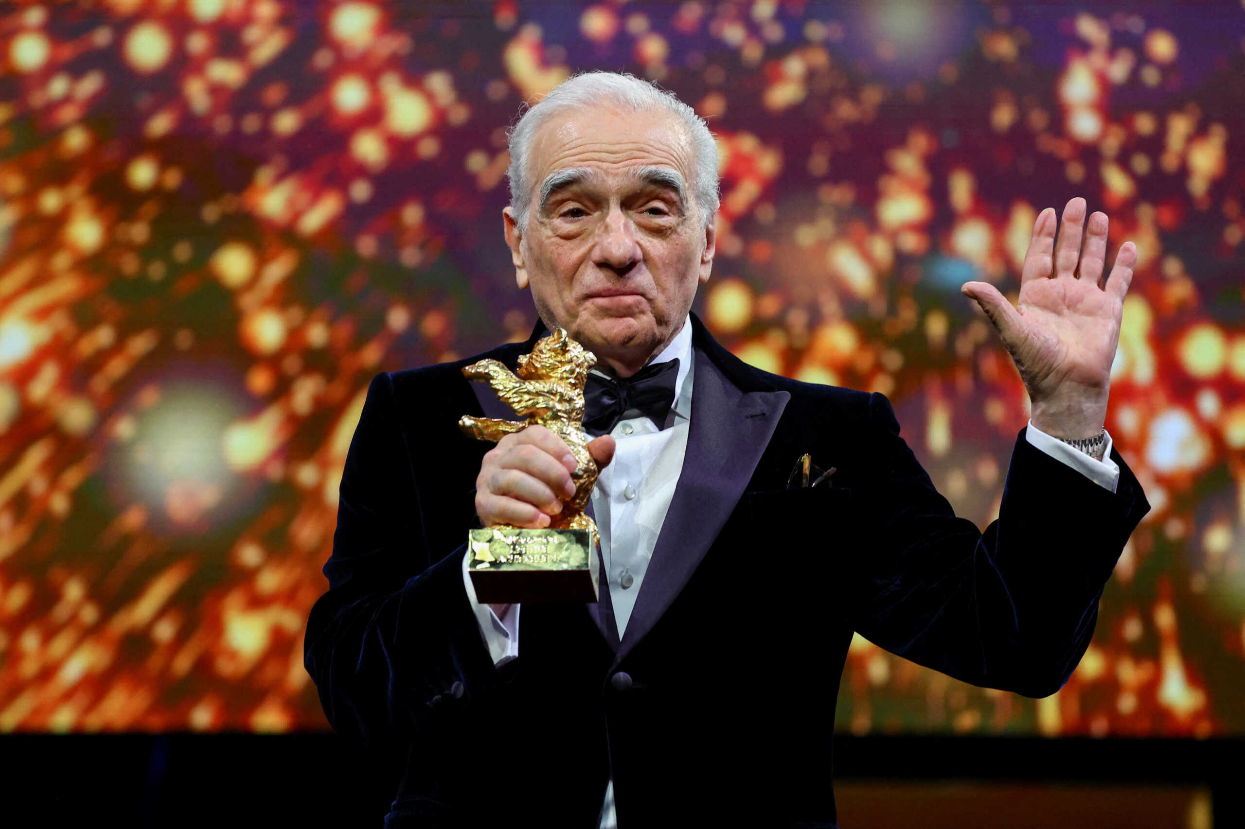 Director Martin Scorsese holds the Honorary Golden Bear for Lifetime Achievement award at the 74th Berlinale International Film Festival in Berlin, Germany February 20, 2024. REUTERS