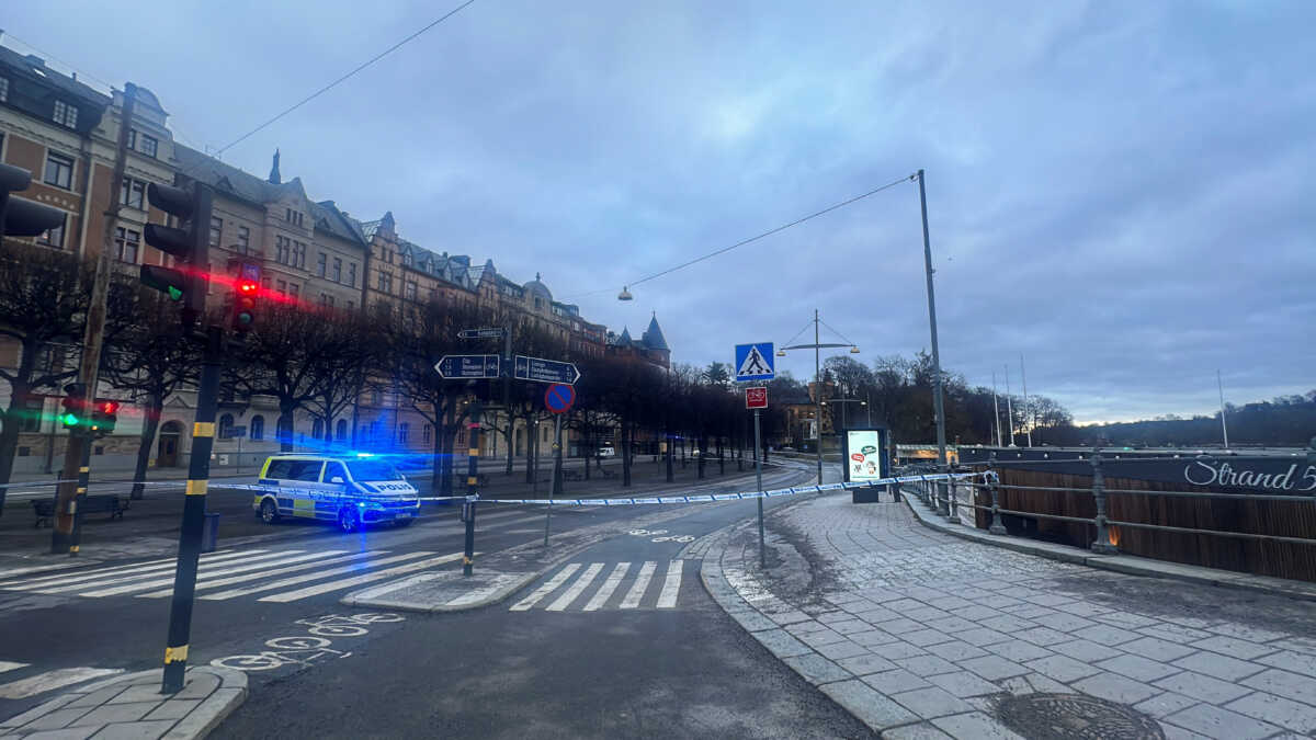 A police vehicle is parked at a cordoned-off area at a road leading to the Israeli embassy, on the day an object believed to be an explosive device was found and destroyed by the national bomb squad according to police, in Stockholm, Sweden, January 31, 2024. REUTERS