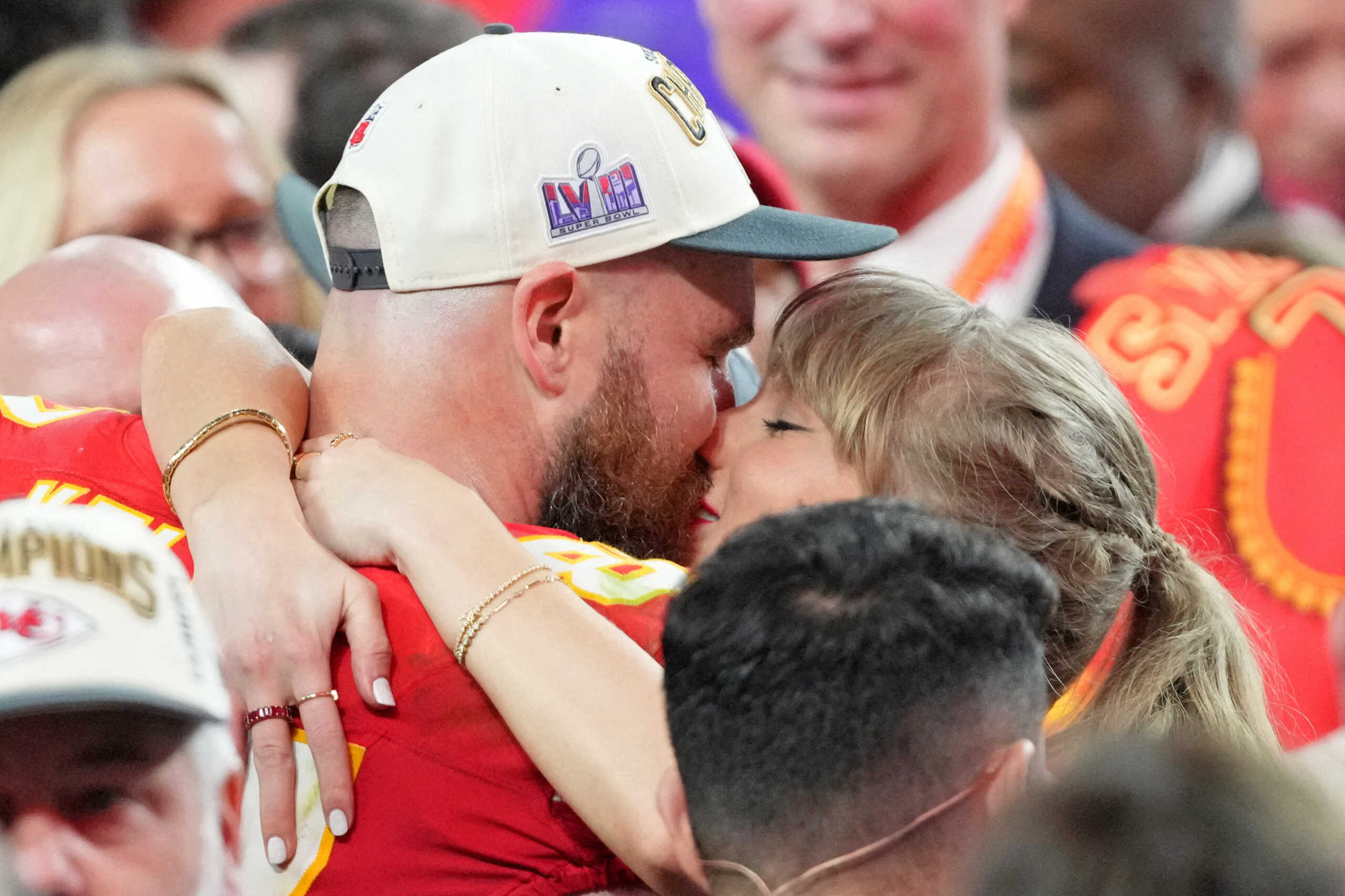 Feb 11, 2024; Paradise, Nevada, USA; Kansas City Chiefs tight end Travis Kelce (87) kisses Recording artist Taylor Swift after winning Super Bowl LVIII against the San Francisco 49ers at Allegiant Stadium. Mandatory Credit: Kyle Terada-USA TODAY Sports