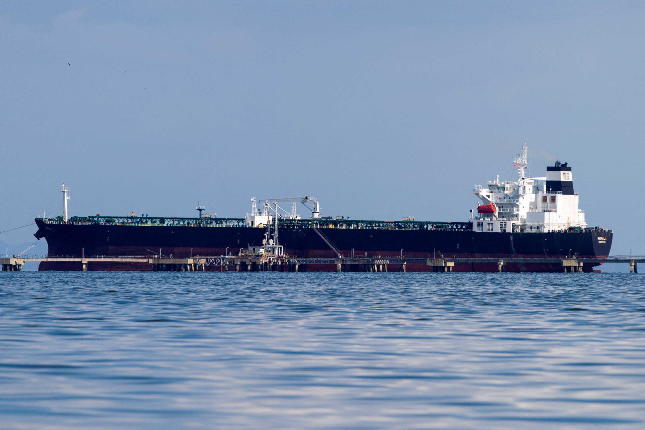 FILE PHOTO: Oil tanker Kerala, chartered by Chevron, is loaded in the Bajo Grande oil terminal at Maracaibo Lake, in the municipality of San Francisco, Venezuela, January 5, 2023. REUTERS