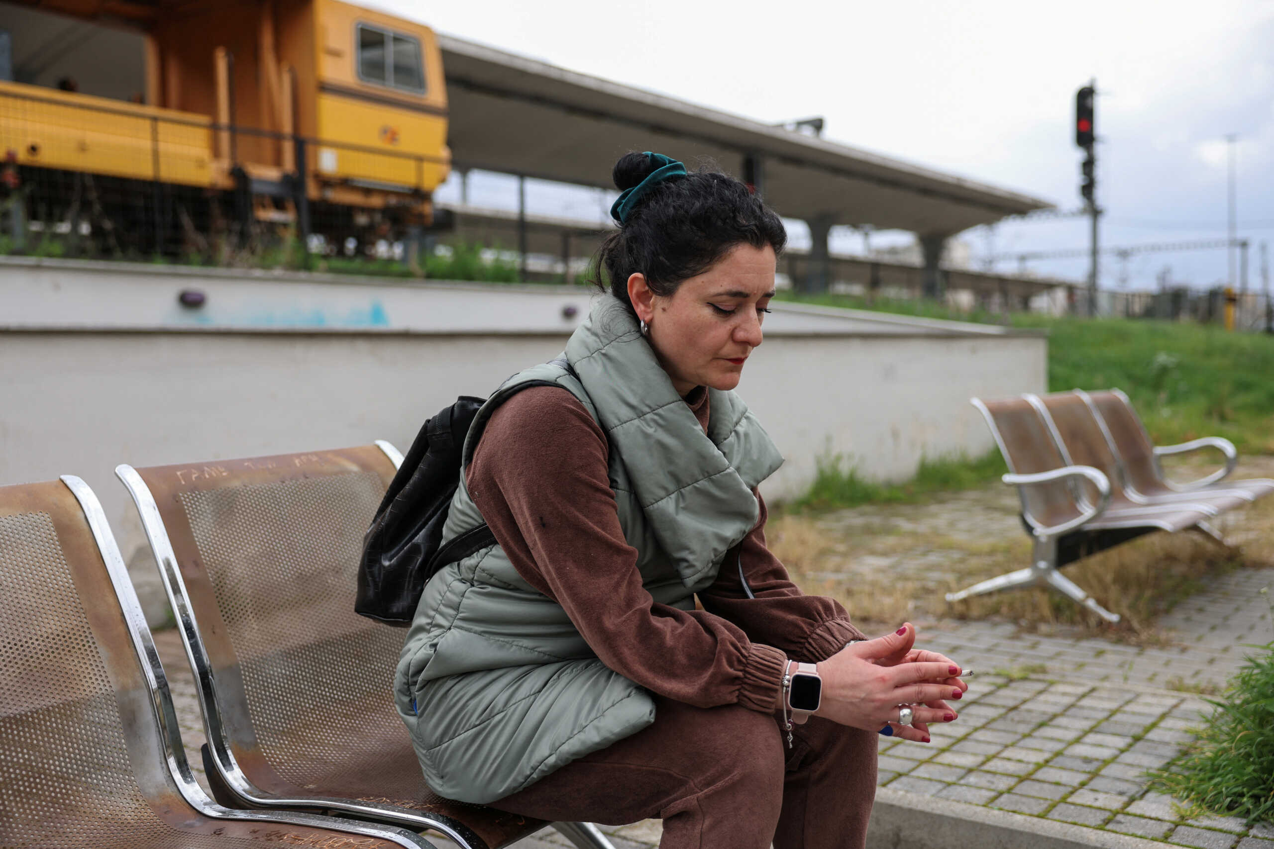 Stavroula Kapsali, 42, a survivor of Greece's deadliest train crash, poses for a photo following an interview with Reuters in Thessaloniki, Greece, February 26, 2024. REUTERS