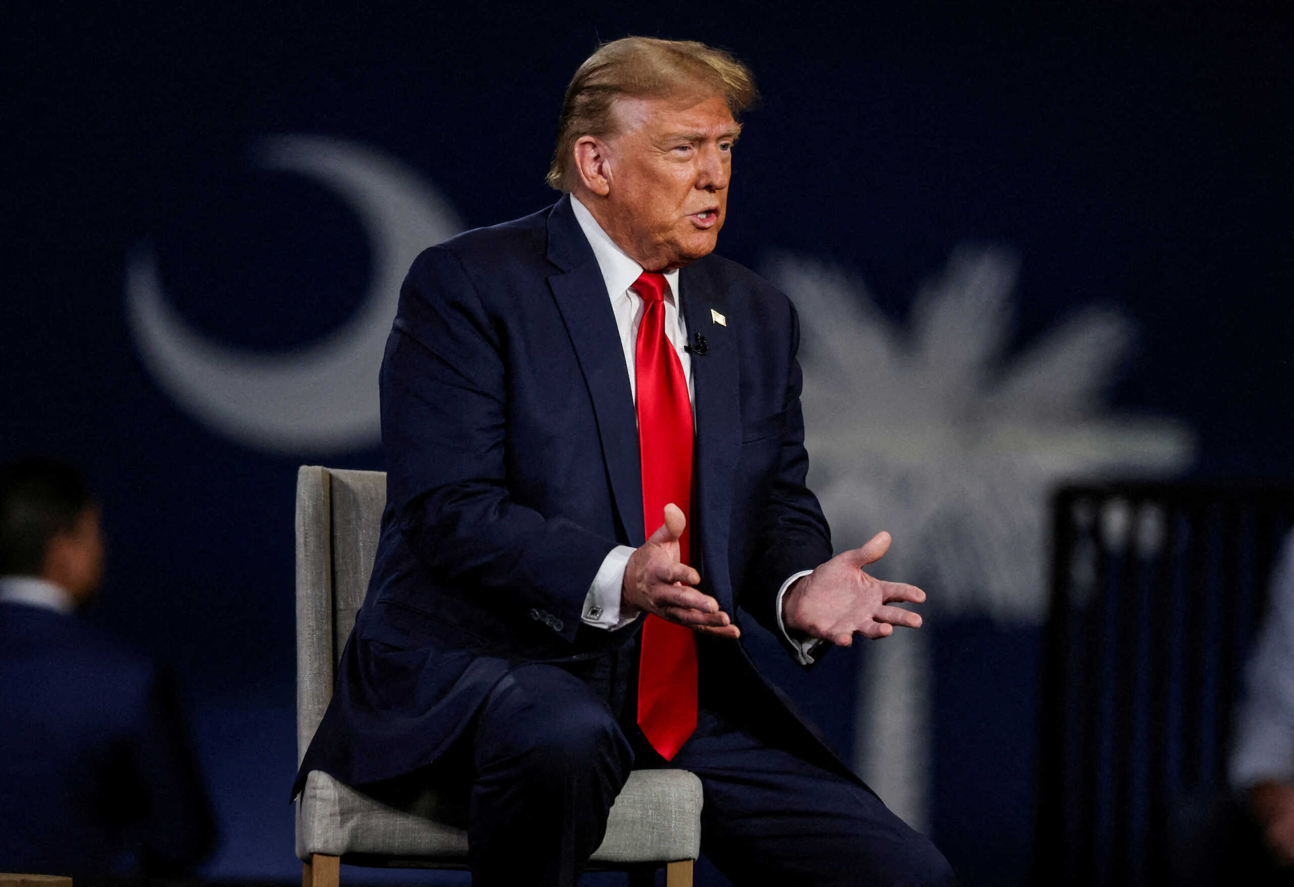 FILE PHOTO: Former U.S. President and Republican presidential candidate Donald Trump participates in a Fox News town hall with Laura Ingraham in Greenville, South Carolina, U.S. February 20, 2024.  REUTERS