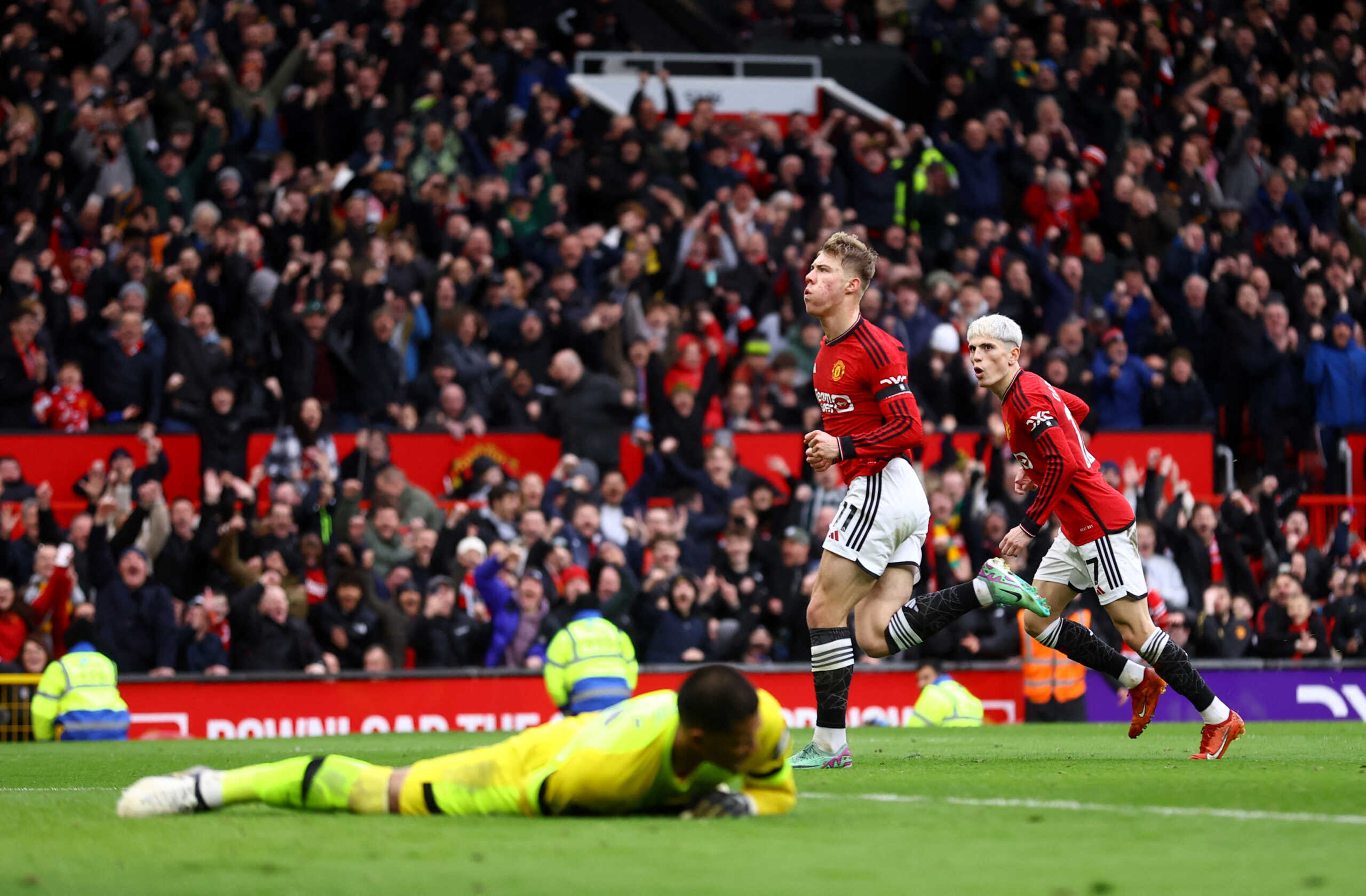 Soccer Football - Premier League - Manchester United v West Ham United - Old Trafford, Manchester, Britain - February 4, 2024 Manchester United's Rasmus Hojlund celebrates scoring their first goal with Alejandro Garnacho REUTERS