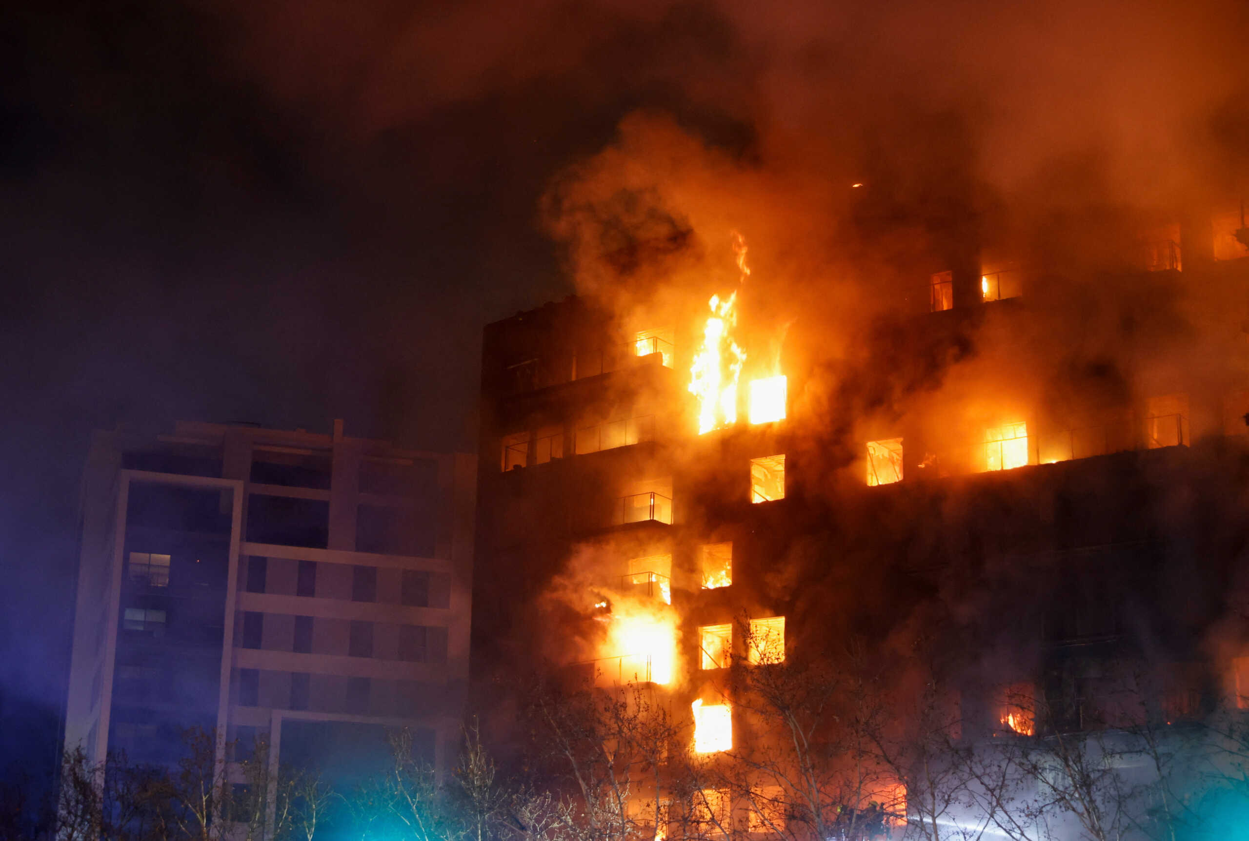A fire burns in an apartment building in Valencia, Spain February 22, 2024. REUTERS