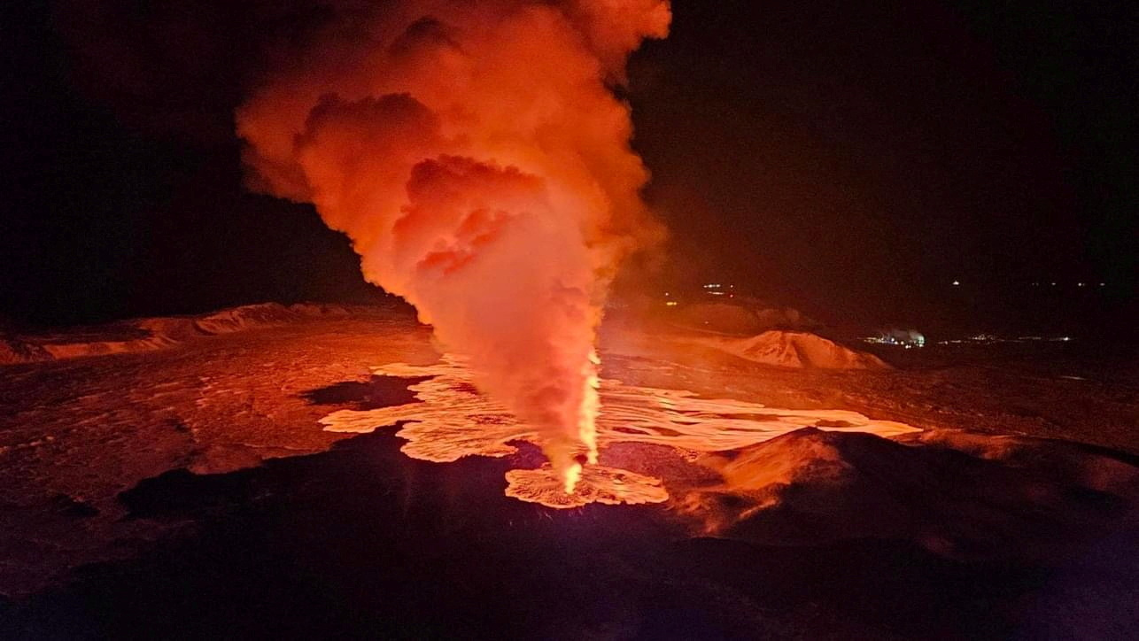 A volcano spews lava and smoke as it erupts on Reykjanes Peninsula, Iceland, February 8, 2024. Iceland Civil Protection