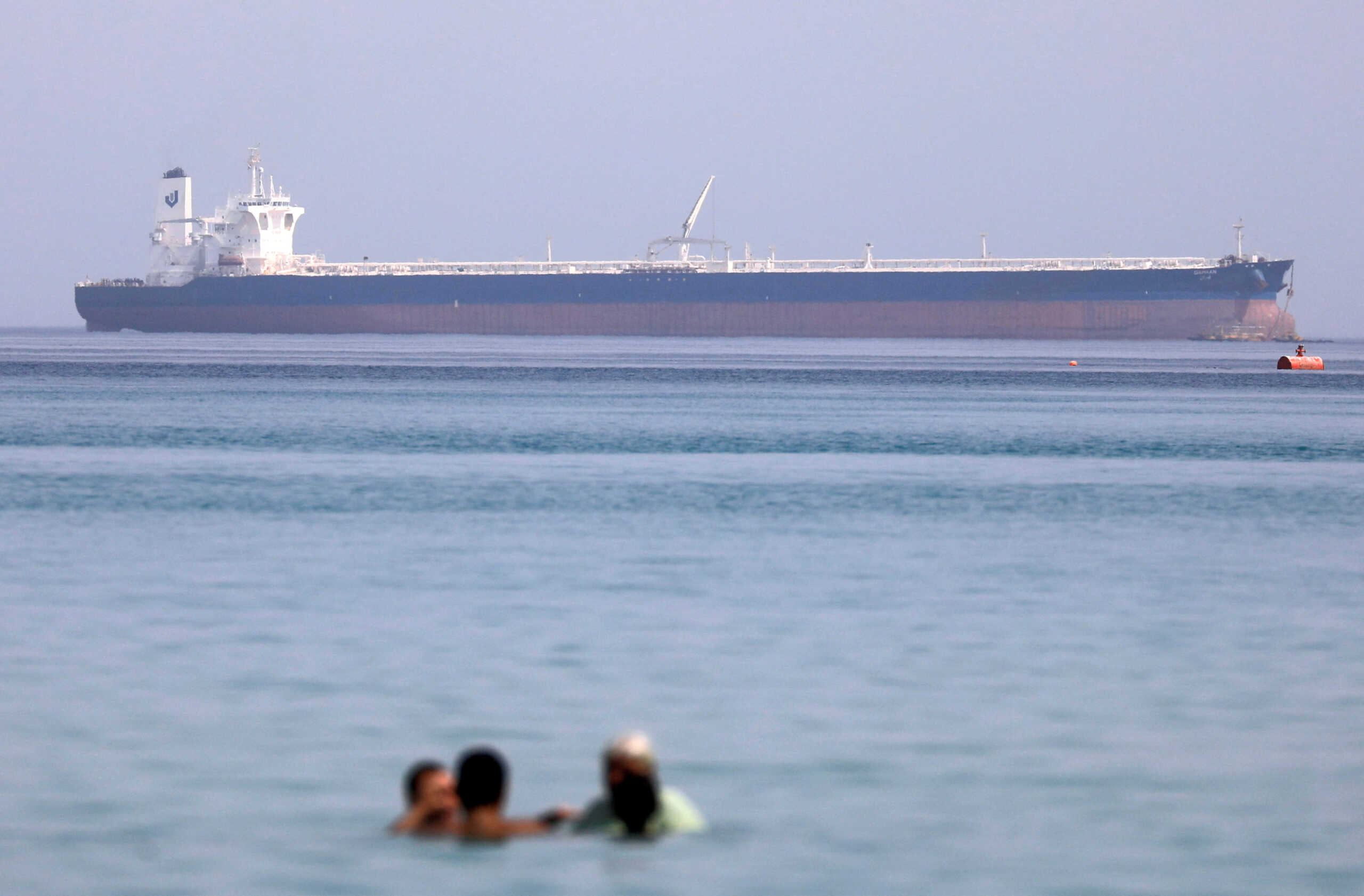 FILE PHOTO: A tanker crosses the Gulf of Suez towards the Red Sea before entering the Suez Canal, in El Ain El Sokhna in Suez, Egypt, September 25, 2020. Picture taken September 25, 2020. REUTERS
