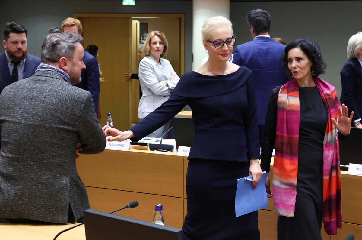 Yulia Navalnaya, the widow of Alexei Navalny, stands with Luxembourg's Foreign Minister Xavier Bettel and Belgium's Foreign Minister Hadja Lahbib, on the day of a meeting of European Union foreign ministers in Brussels, Belgium February 19, 2024. REUTERS