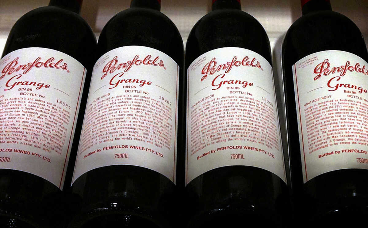FILE PHOTO: Bottles of Penfolds Grange, made by Australian wine maker Penfolds and owned by Australia's Treasury Wine Estates, sit on a shelf for sale at a wine shop in central Sydney, Australia, August 4, 2014.   REUTERS