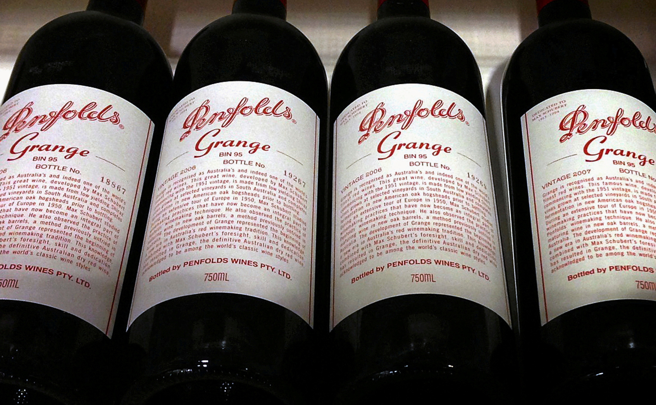 FILE PHOTO: Bottles of Penfolds Grange, made by Australian wine maker Penfolds and owned by Australia's Treasury Wine Estates, sit on a shelf for sale at a wine shop in central Sydney, Australia, August 4, 2014.   REUTERS