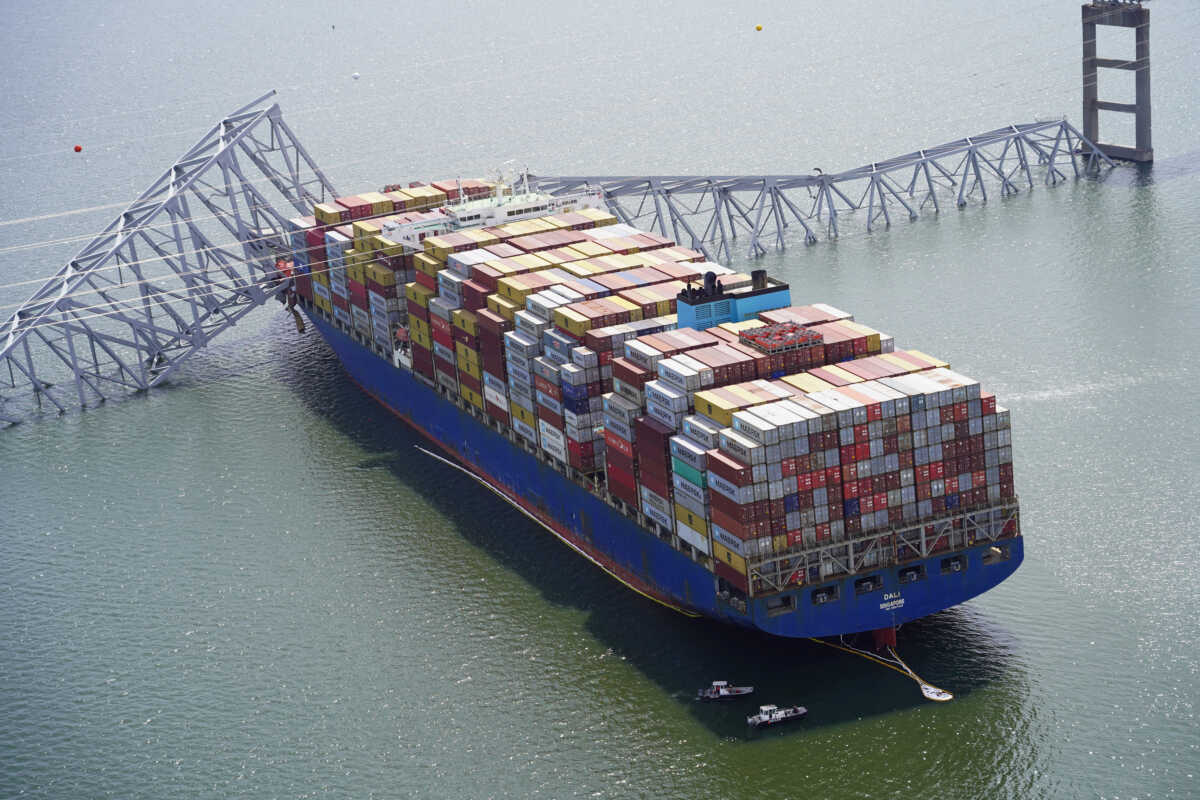 Aerial view of the Dali cargo vessel which crashed into the Francis Scott Key Bridge, causing it to collapse in Baltimore, Maryland, U.S., March 26, 2024. Maryland National Guard