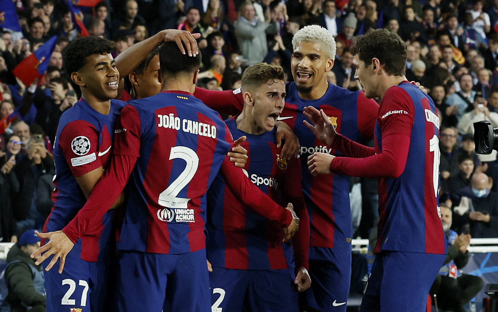 Soccer Football - Champions League - Round of 16 - Second Leg - FC Barcelona v Napoli - Estadi Olimpic Lluis Companys, Barcelona, Spain - March 12, 2024 FC Barcelona's Fermin Lopez celebrates scoring their first goal with teammates REUTERS