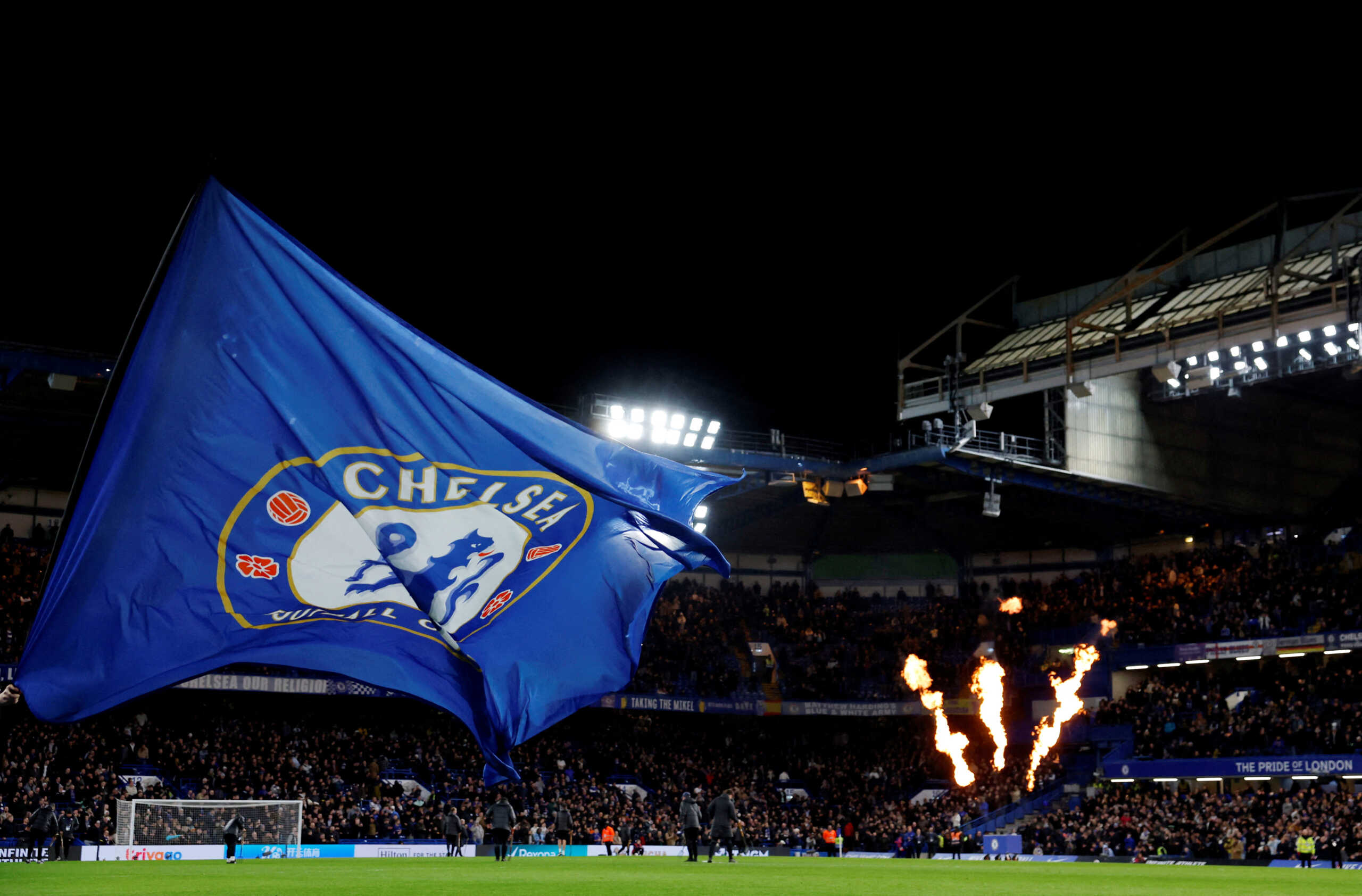 FILE PHOTO: Soccer Football -  FA Cup - Fourth Round - Chelsea v Aston Villa - Stamford Bridge, London, Britain - January 26, 2024 General view of a Chelsea flag beside the pitch before the match Action Images via Reuters