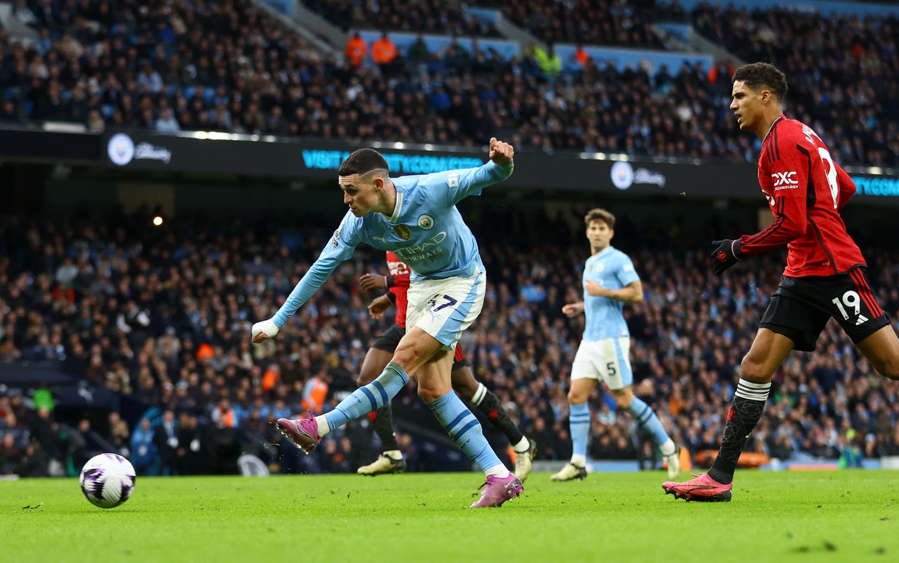 Soccer Football - Premier League - Manchester City v Manchester United - Etihad Stadium, Manchester, Britain - March 3, 2024 Manchester City's Phil Foden scores their second goal REUTERS