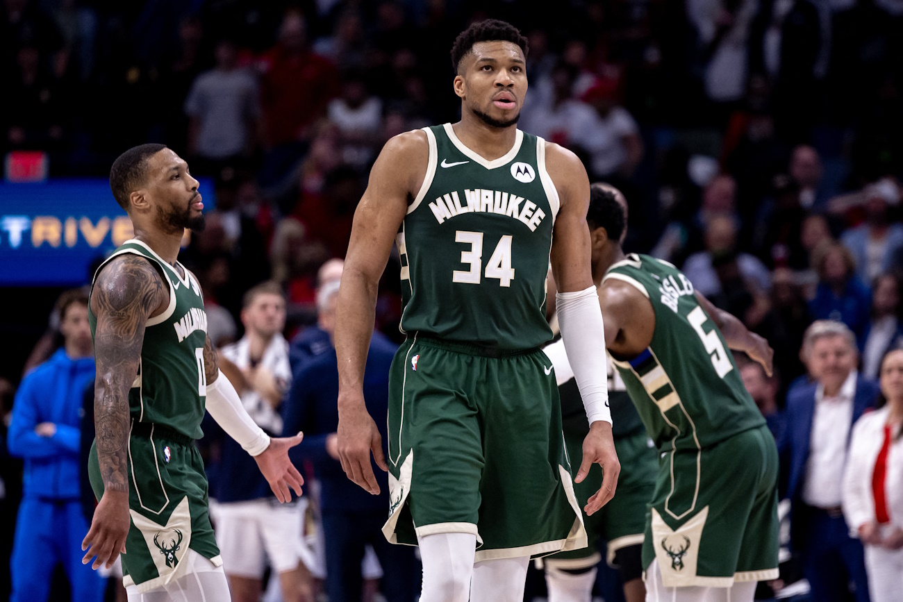 Mar 28, 2024; New Orleans, Louisiana, USA;   Milwaukee Bucks forward Giannis Antetokounmpo (34) and guard Damian Lillard (0) head to the bench on a timer out against the New Orleans Pelicans during the second half at Smoothie King Center. Mandatory Credit: Stephen Lew-USA TODAY Sports