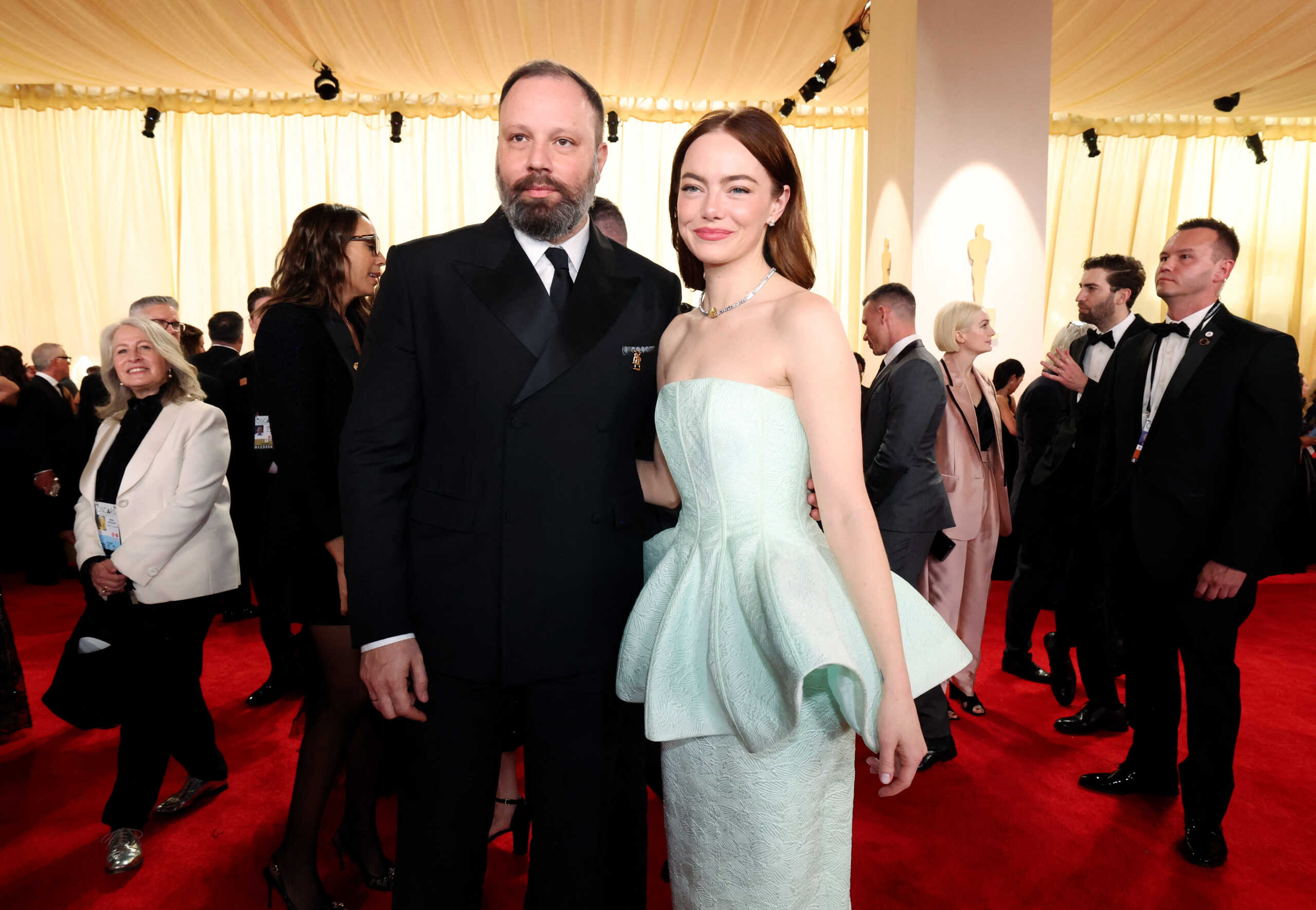 Yorgos Lanthimos and Emma Stone pose on the red carpet during the Oscars arrivals at the 96th Academy Awards in Hollywood, Los Angeles, California, U.S., March 10, 2024. REUTERS