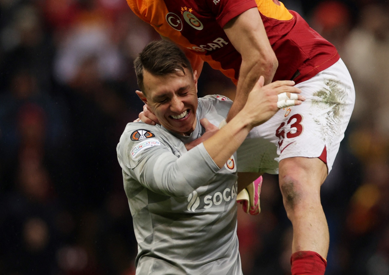 Soccer Football - Europa League - Play-Off - First Leg - Galatasaray v Sparta Prague - RAMS Park, Istanbul, Turkey - February 15, 2024 Galatasaray's Fernando Muslera and Baris Alper Yilmaz celebrate after the match REUTERS