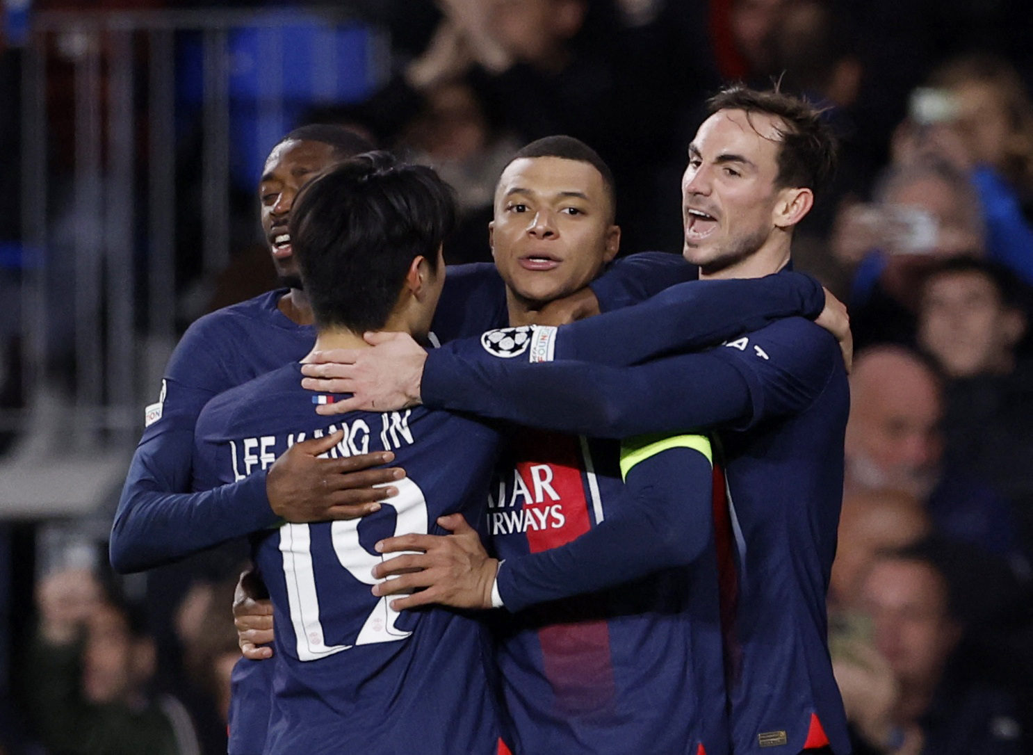 Soccer Football - Champions League - Round of 16 - Second Leg - Real Sociedad v Paris St Germain - Reale Arena, San Sebastian, Spain - March 5, 2024 Paris St Germain's Kylian Mbappe celebrates scoring their second goal with Lee Kang-in, Ousmane Dembele and Fabian Ruiz REUTERS