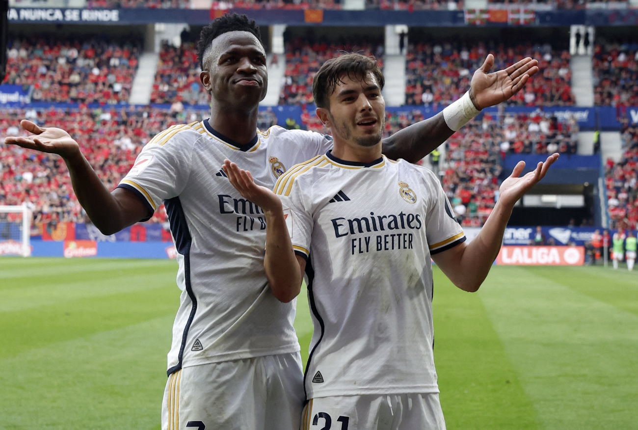 Soccer Football - LaLiga - Osasuna v Real Madrid - El Sadar Stadium, Pamplona, Spain - March 16, 2024 Real Madrid's Brahim Diaz celebrates scoring their third goal with Vinicius Junior REUTERS