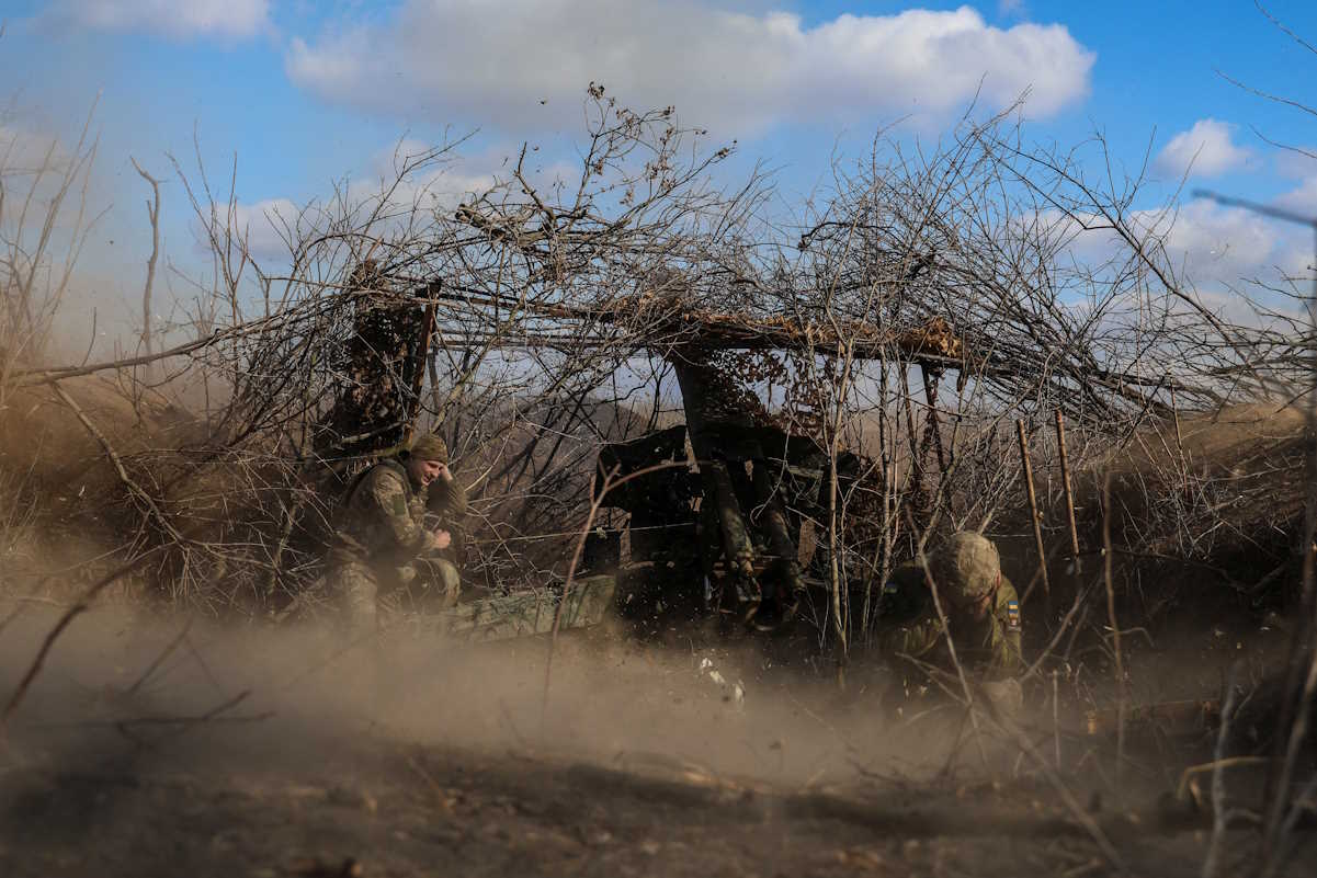 Ukrainian service members fire a D-20 howitzer toward Russian troops, amid Russia's attack on Ukraine, in Donetsk region, Ukraine March 11, 2024.  REUTERS