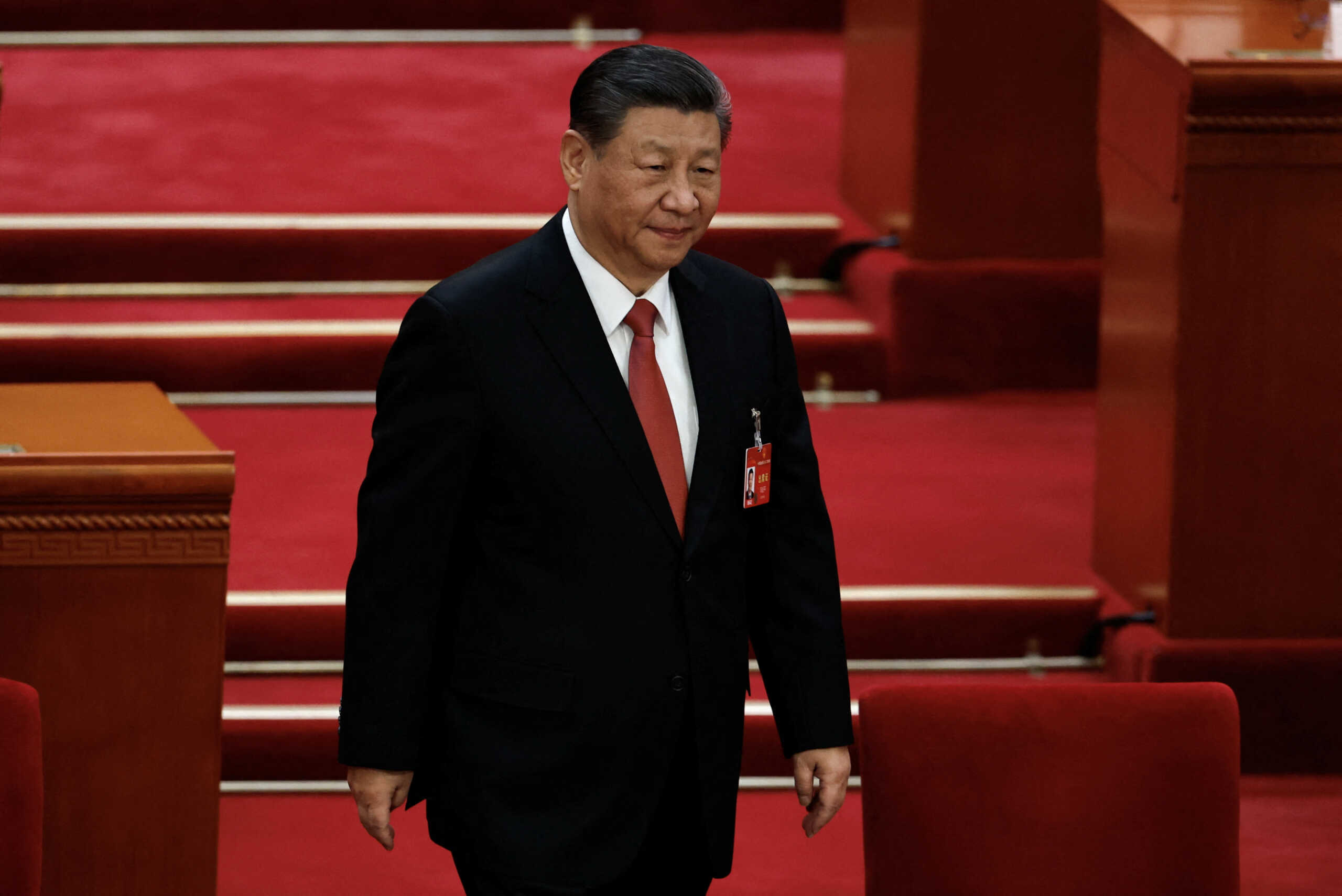 Chinese President Xi Jinping arrives for the closing session of the National People's Congress (NPC) at the Great Hall of the People in Beijing, China March 11, 2024. REUTERS