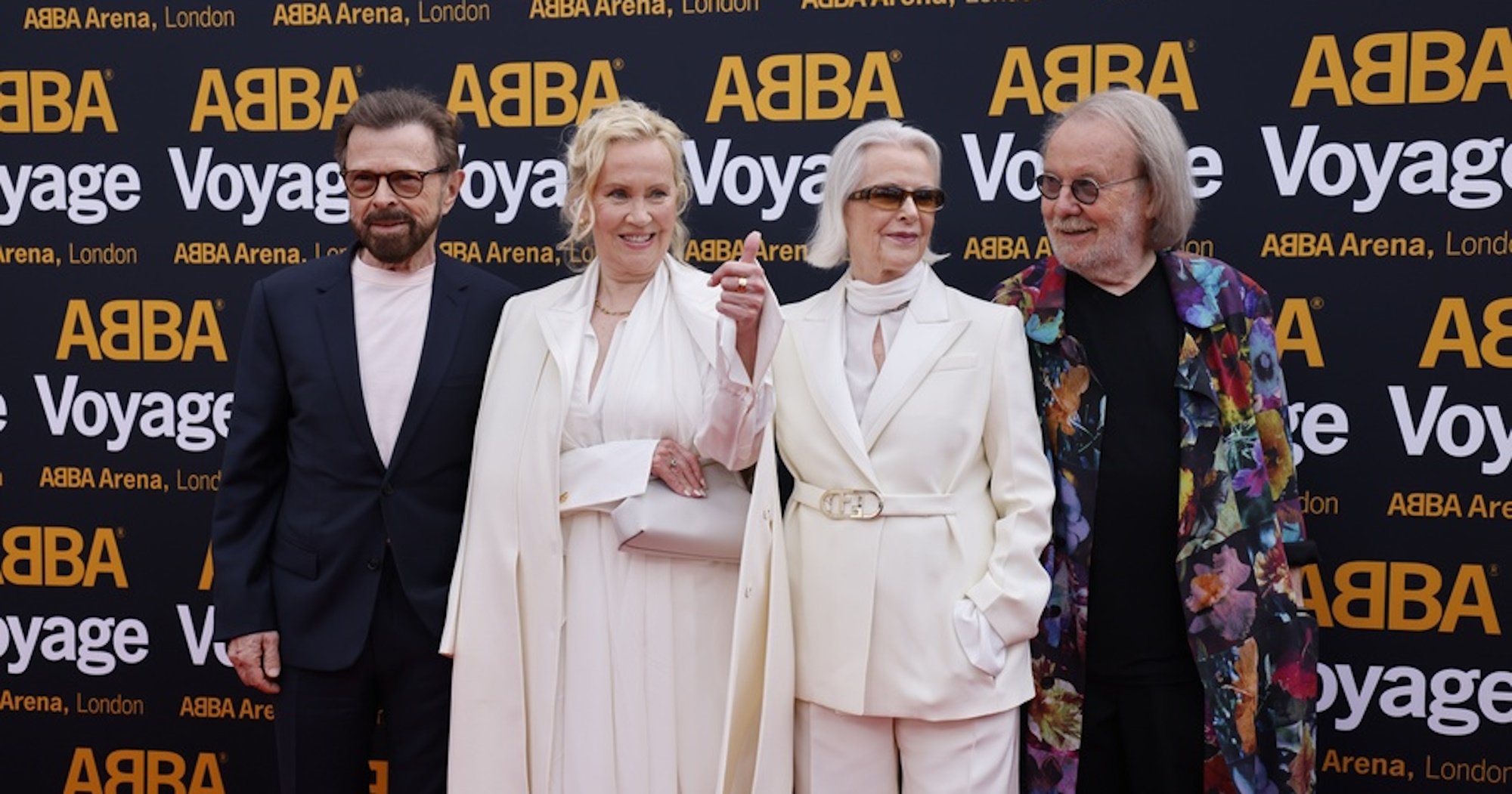 epa09978115 (L-R)  Bjorn Ulvaeus, Agnetha Faltskog, Anni-Frid Lyngstad and Benny Andersson on the red carpet for the opening performance of the ABBA Voyage show at the ABBA Arena at Queen Elizabeth Olympic Park, London, Britain, 26 May 2022. The show is a digital concert experience where the group will perform as digital versions of themselves (Avatars) on a virtual stage. The show will use motion capture technology which will enable the fans to watch the group perform at different stages of their career.  EPA