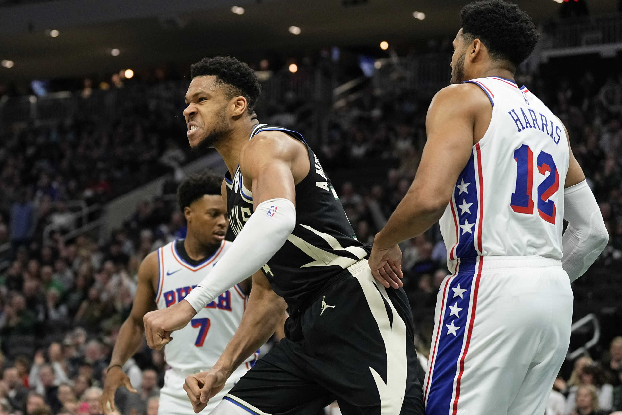 Mar 14, 2024; Milwaukee, Wisconsin, USA;  Milwaukee Bucks forward Giannis Antetokounmpo (34) reacts after scoring a basket during the first quarter against the Philadelphia 76ers at Fiserv Forum. Mandatory Credit: Jeff Hanisch-USA TODAY Sports