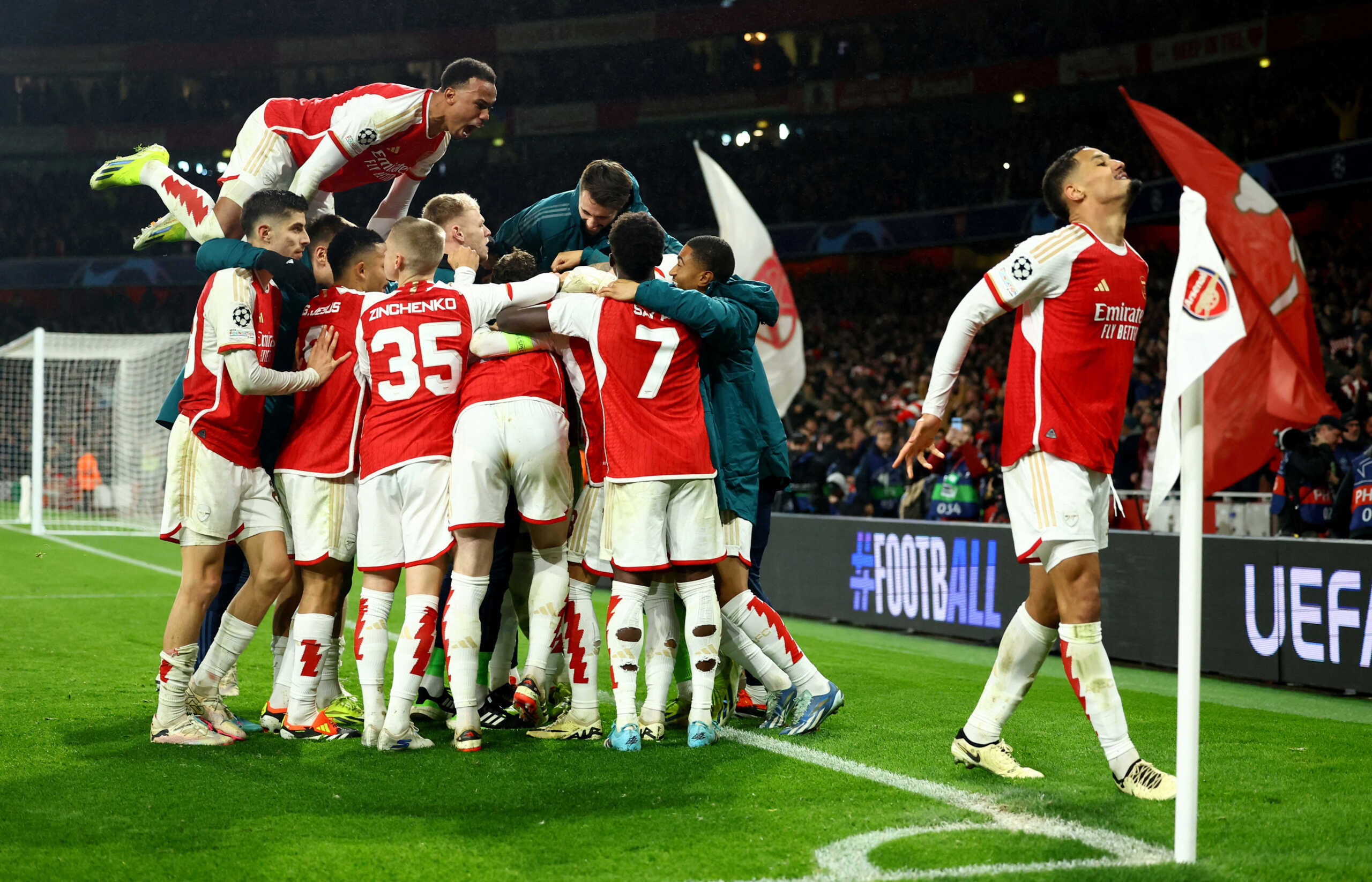 Soccer Football - Champions League - Round of 16 - Second Leg - Arsenal v FC Porto - Emirates Stadium, London, Britain - March 12, 2024 Arsenal players celebrate after the match REUTERS