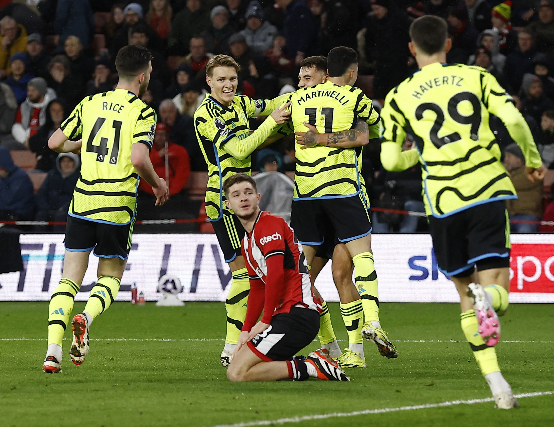 Soccer Football - Premier League - Sheffield United v Arsenal - Bramall Lane, Sheffield, Britain - March 4, 2024 Arsenal's Gabriel Martinelli celebrates scoring their third goal with teammates Action Images via Reuters