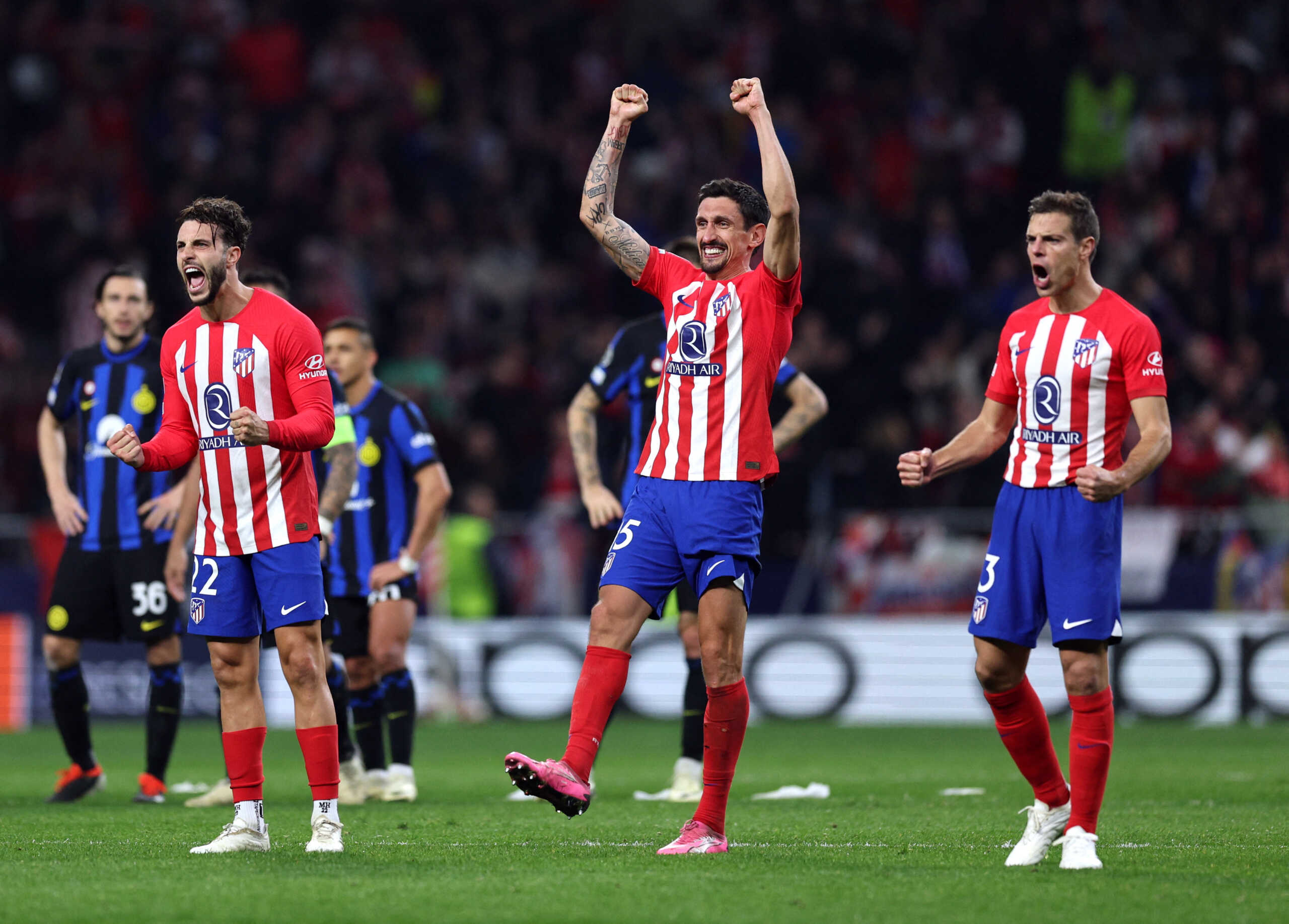 Soccer Football - Champions League - Round of 16 - Second Leg - Atletico Madrid v Inter Milan - Metropolitano, Madrid, Spain - March 13, 2024  Atletico Madrid's Mario Hermoso, Stefan Savic and Cesar Azpilicueta react during the penalty shoot-out REUTERS