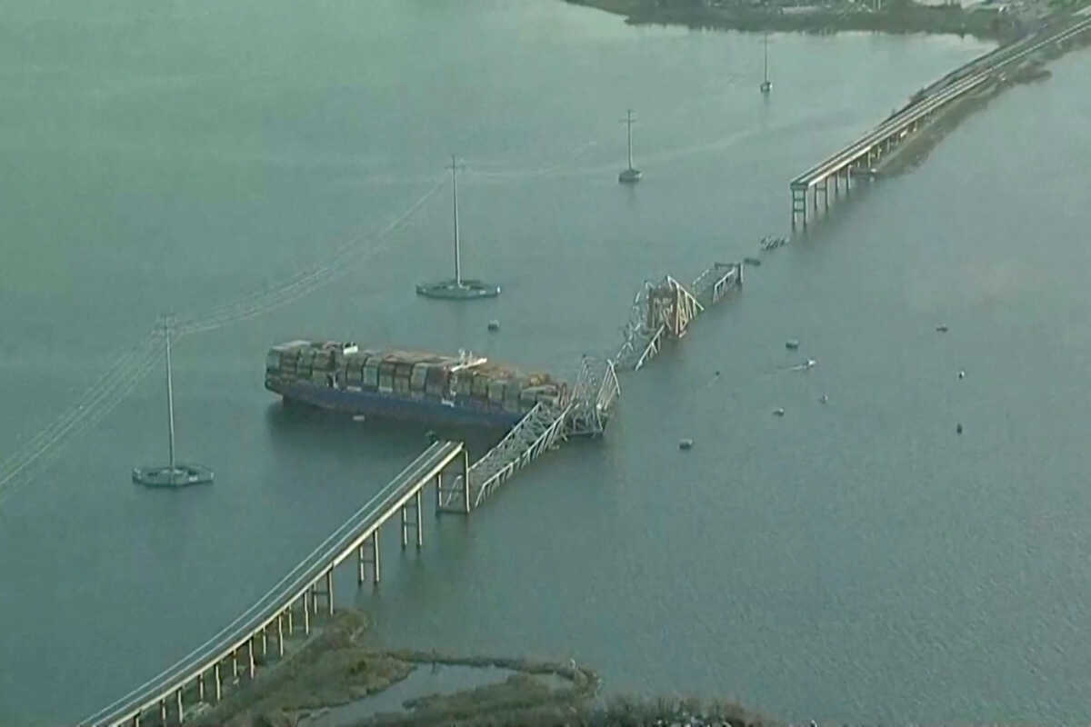 An aerial view of the Dali cargo vessel which crashed into the Francis Scott Key Bridge causing it to collapse in Baltimore, Maryland, U.S., March 26, 2024, in this still image taken from a video.  ABC AFFILIATE WJLA via REUTERS. THIS IMAGE HAS BEEN SUPPLIED BY A THIRD PARTY.  NO RESALES. NO ARCHIVES. MANDATORY CREDIT.