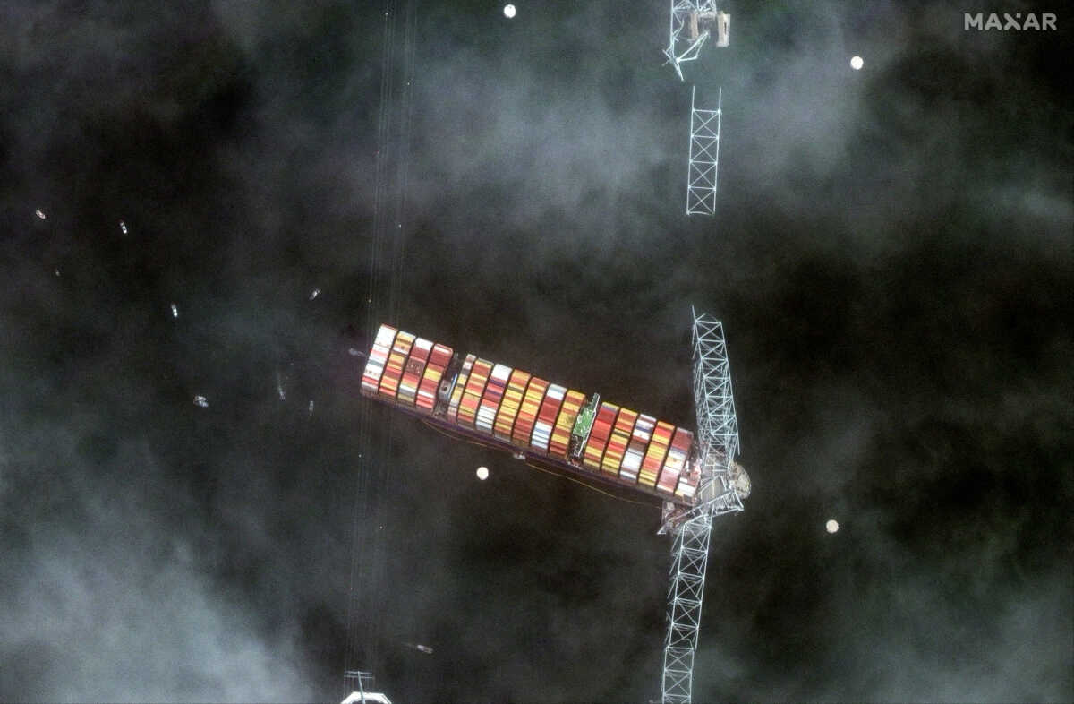 FILE PHOTO: A satellite image shows a closer view of the Dali container ship and a collpased Francis Scott Key Bridge in Baltimore, Maryland, U.S., March 26, 2024. Maxar Technologies